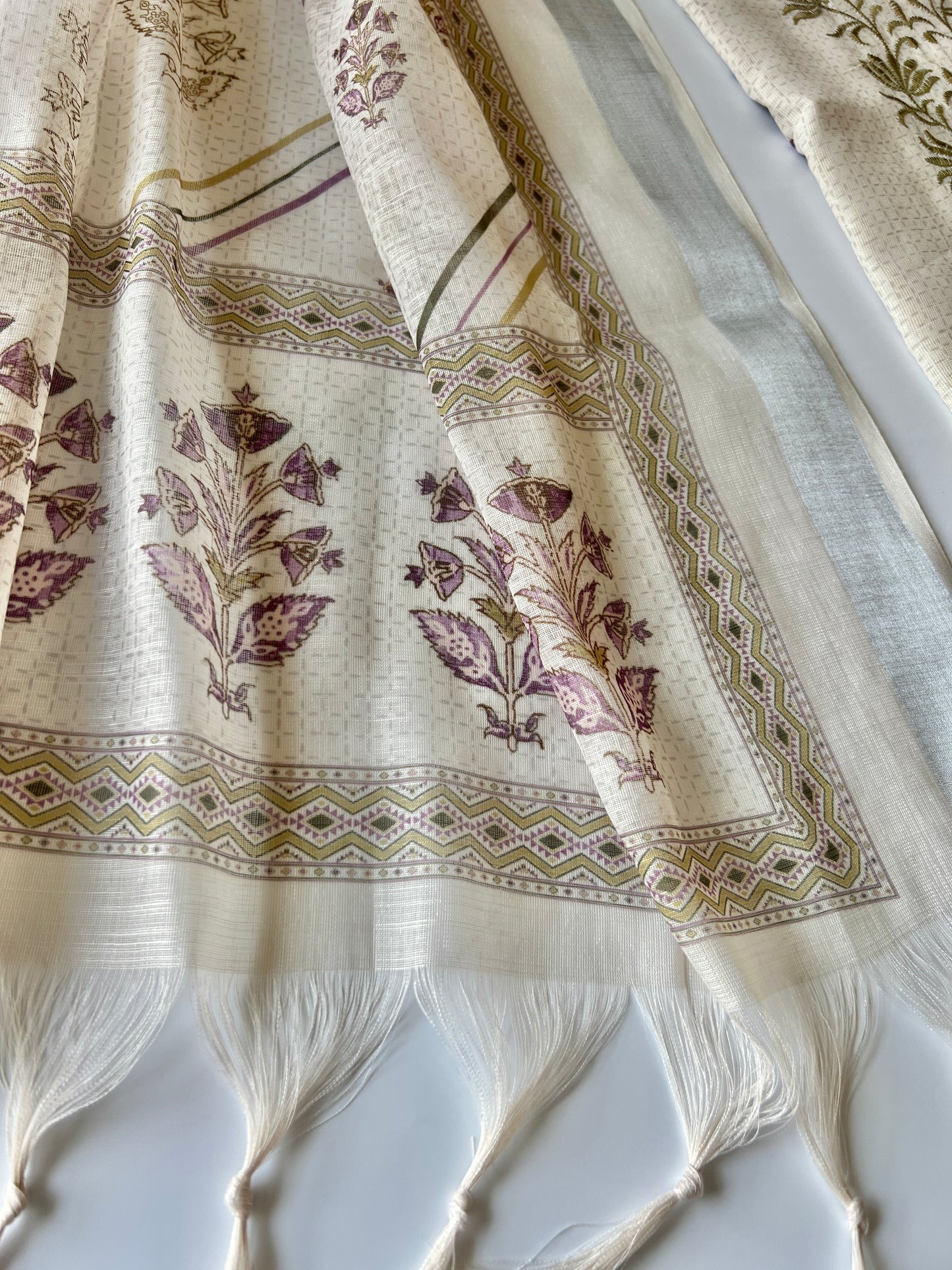 Elegant cream salwar suit set with lightweight mul linen fabric and delicate handcrafted pitta work