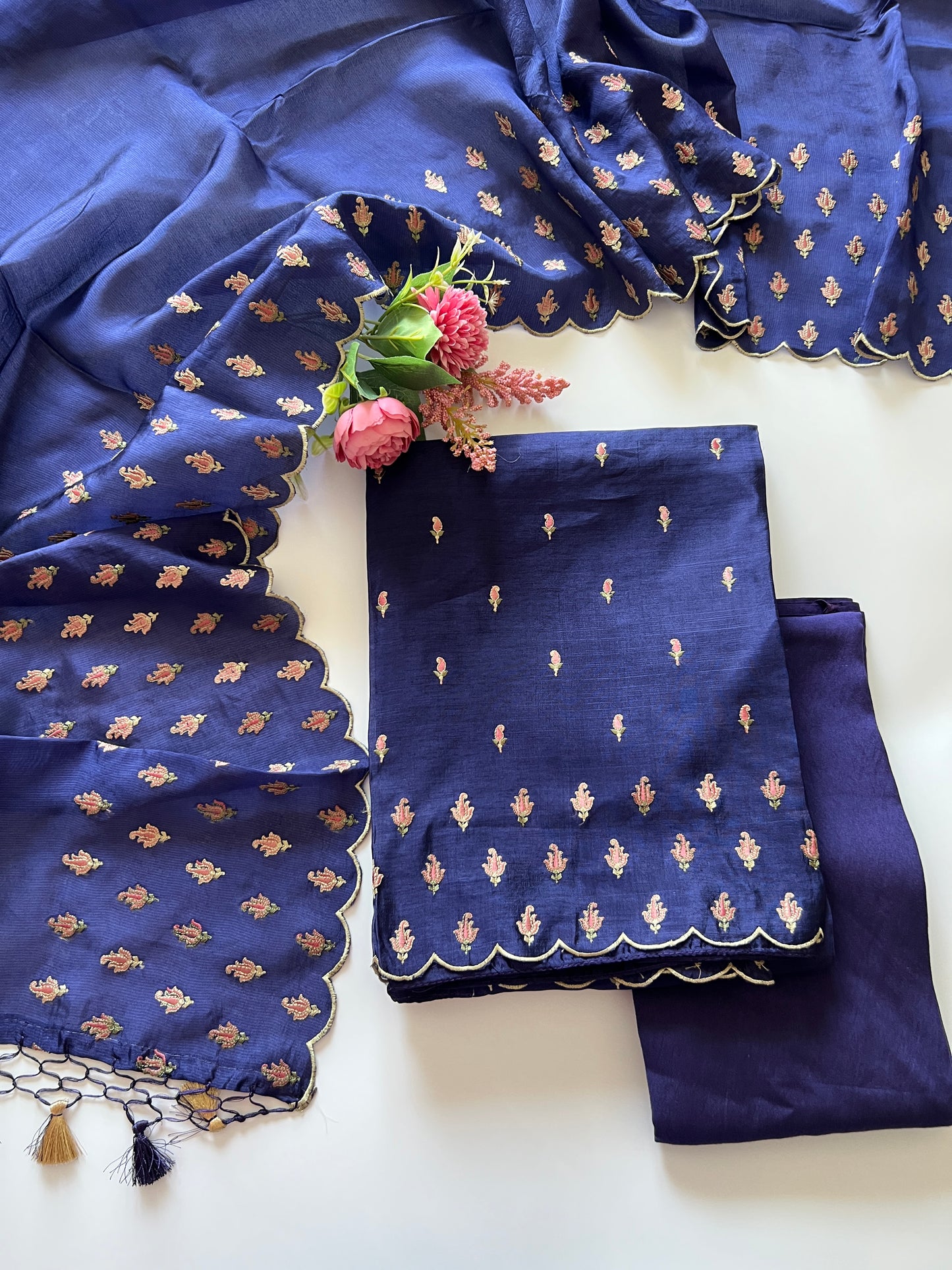 Blue Raw Mango handloom embroidered unstitched suit.