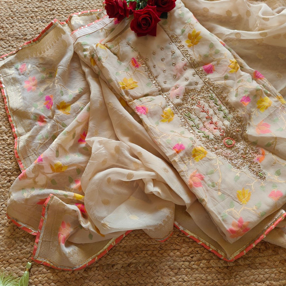 Off white Party wear Unstitched suit with colorfull weaving