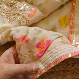 Off white Party wear Unstitched suit with colorfull weaving