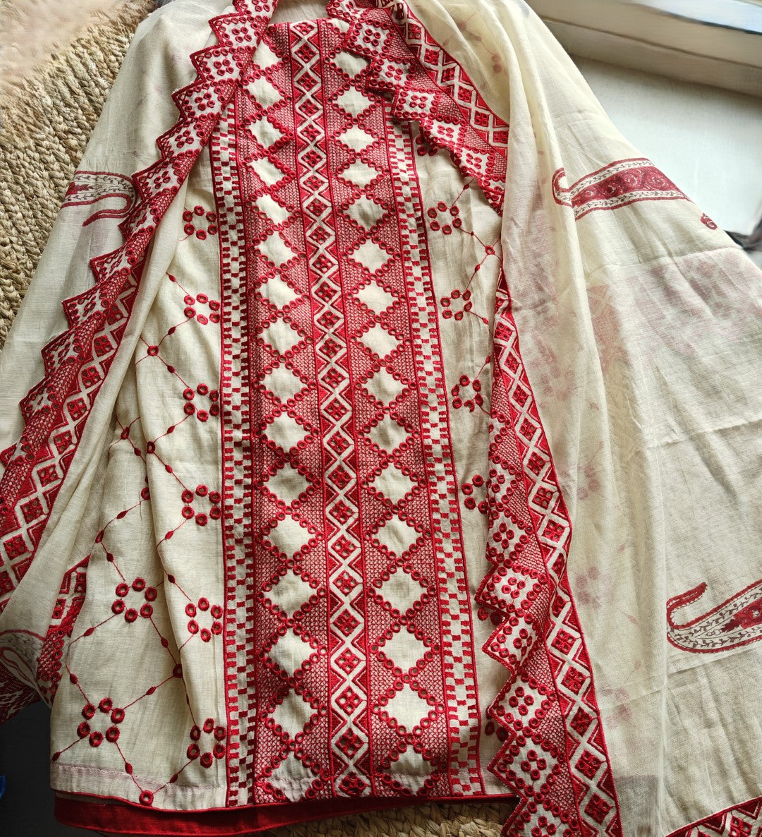 Chanderi cutwork embroidery Unstitched suit. Off white read salwar suit
