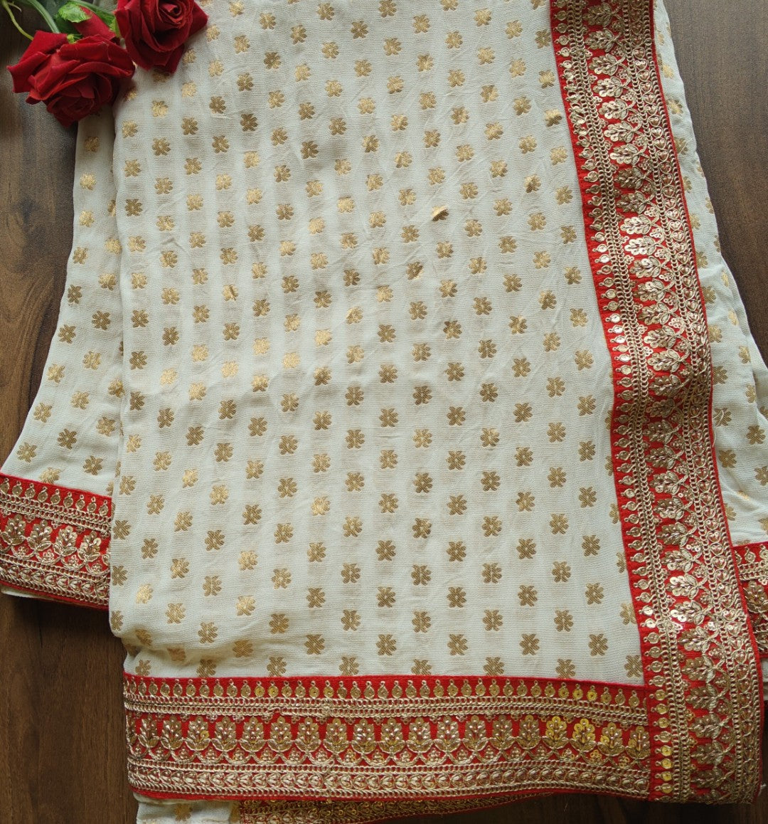 Off white Saree with Red border. Traditional sari