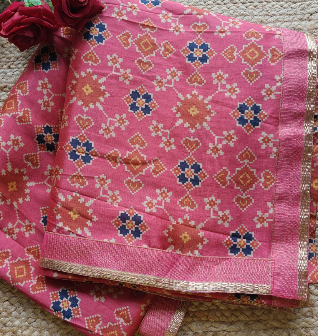 Pink tussar silk patola print saree.