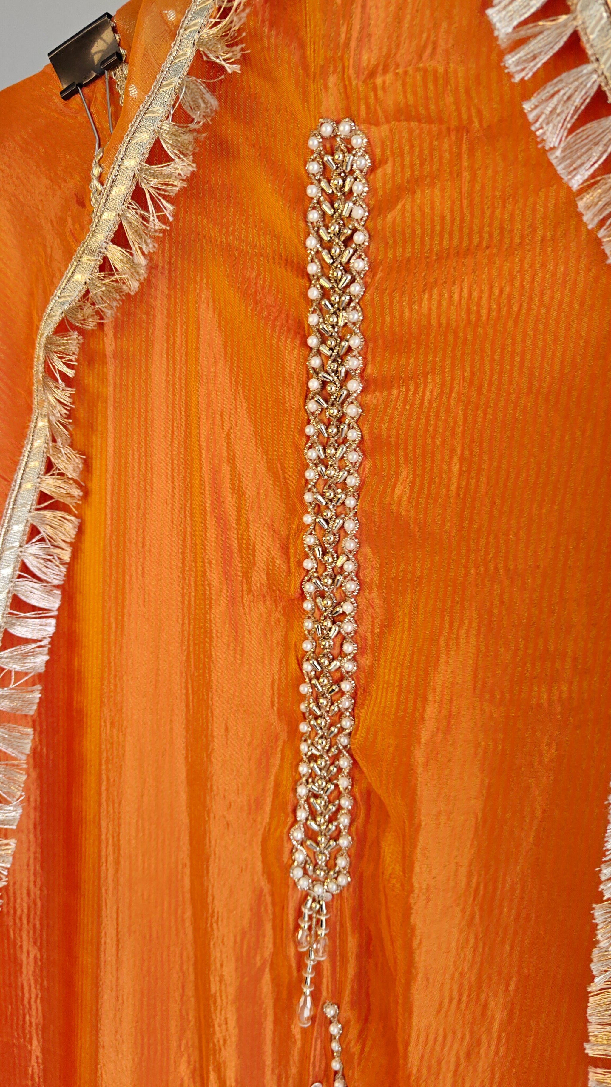 Orange Designer Partywear shimmer tissue unstitched suit.