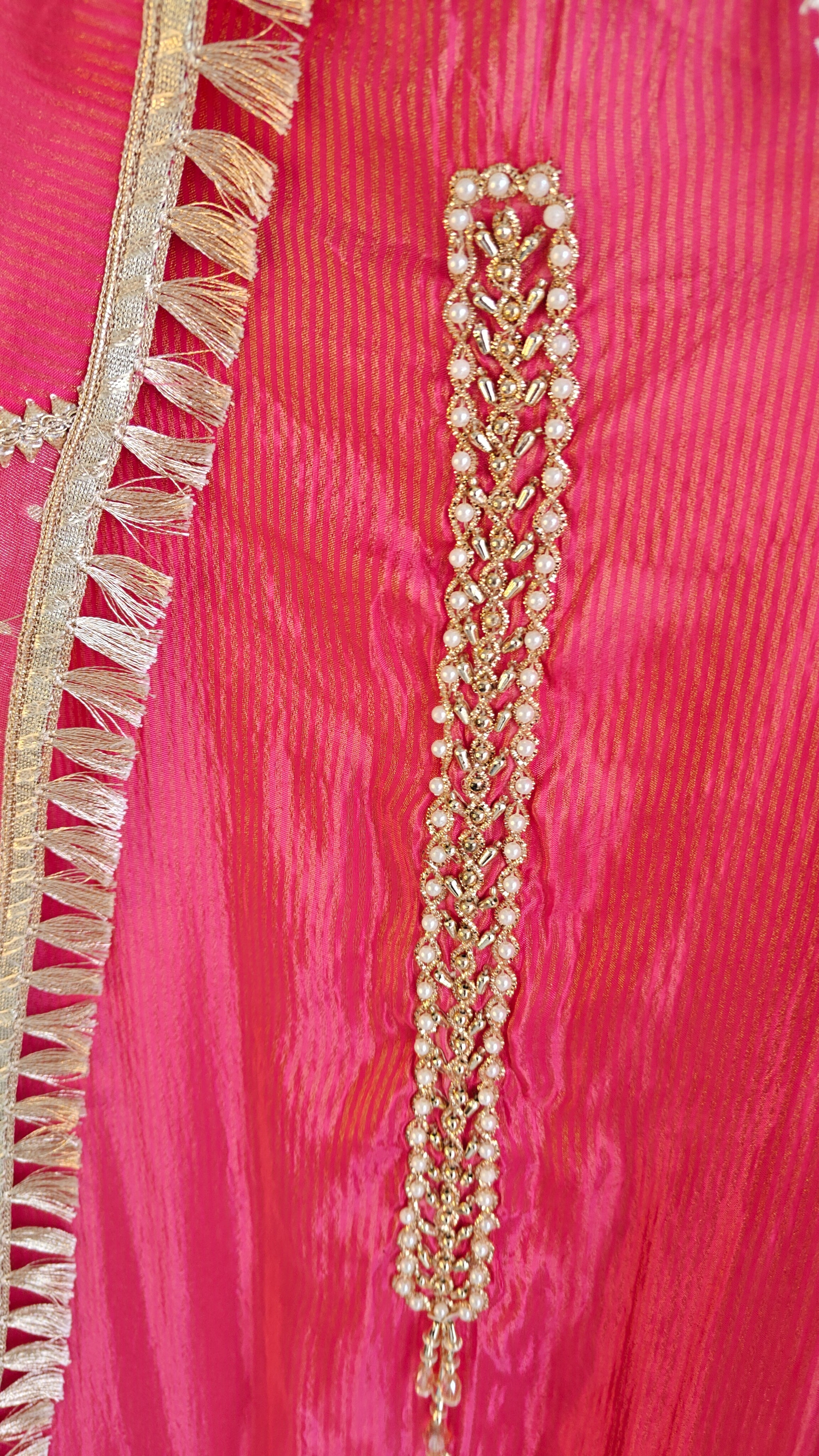 Pink Designer Partywear shimmer tissue unstitched suit.