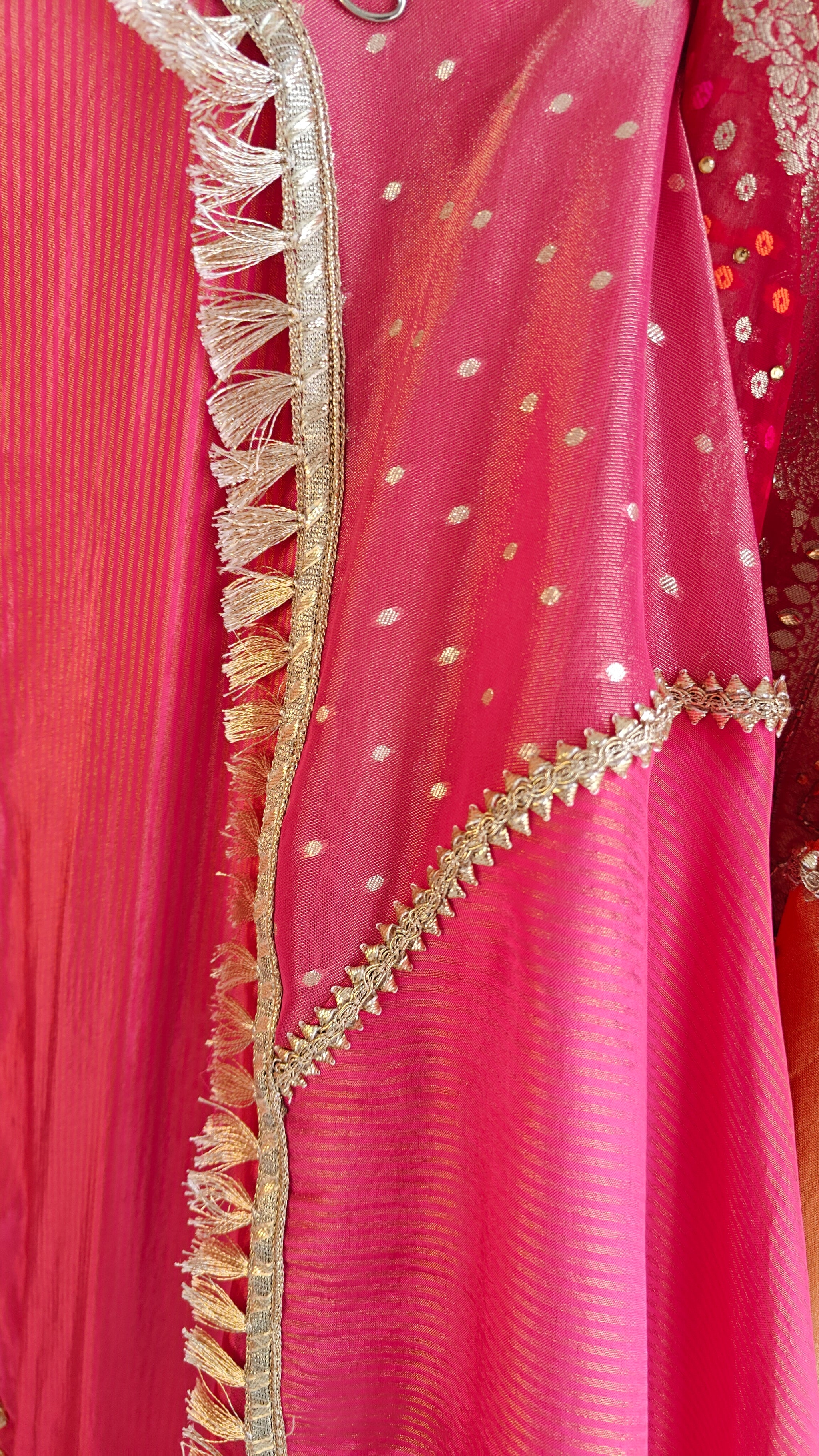 Pink Designer Partywear shimmer tissue unstitched suit.