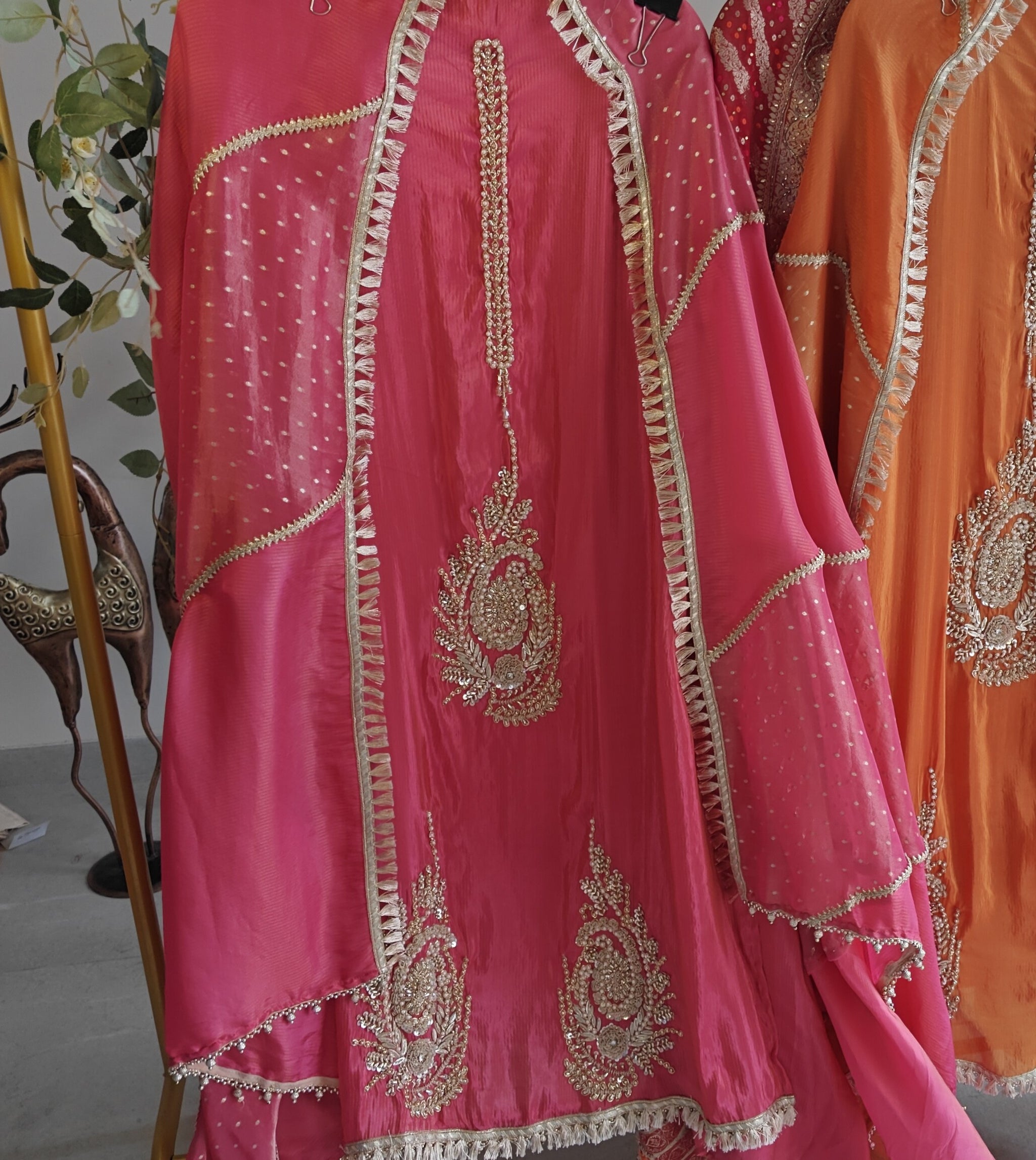Pink Designer Partywear shimmer tissue unstitched suit.