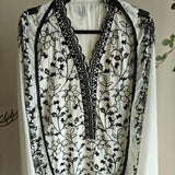 White with Black embroidery dress material with sequin detailing