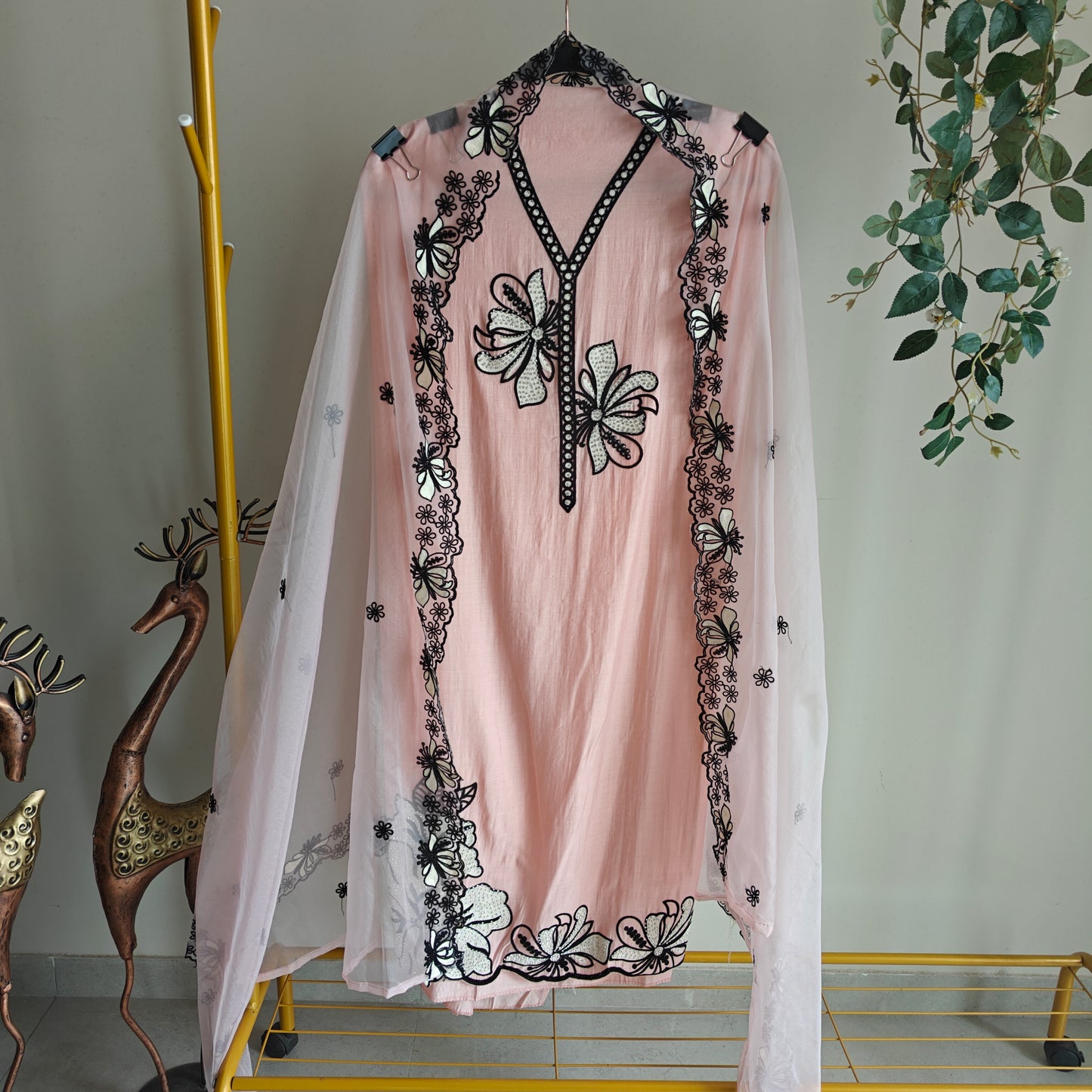 Peach pink tissue dress material with black embroidery