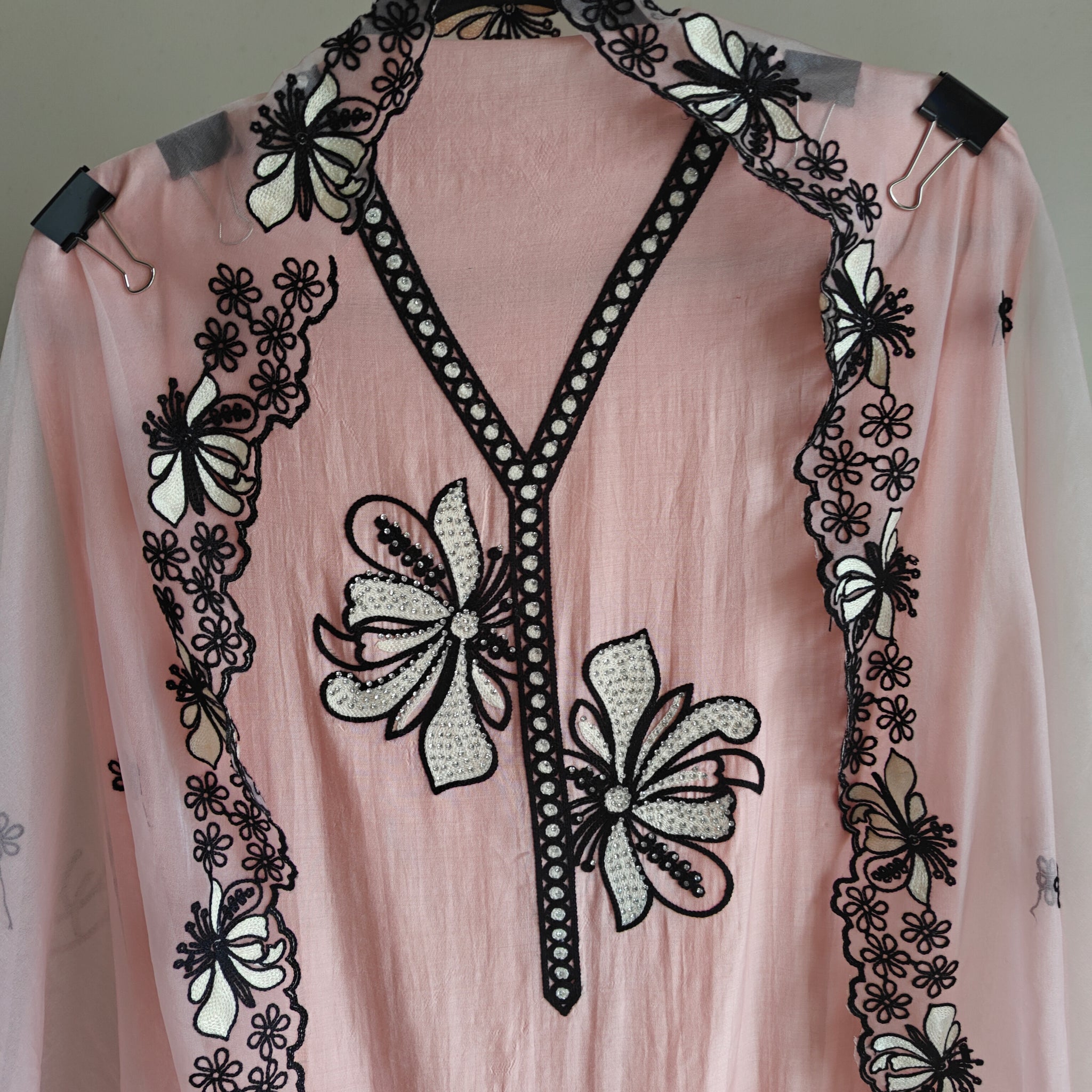 Peach pink tissue dress material with black embroidery