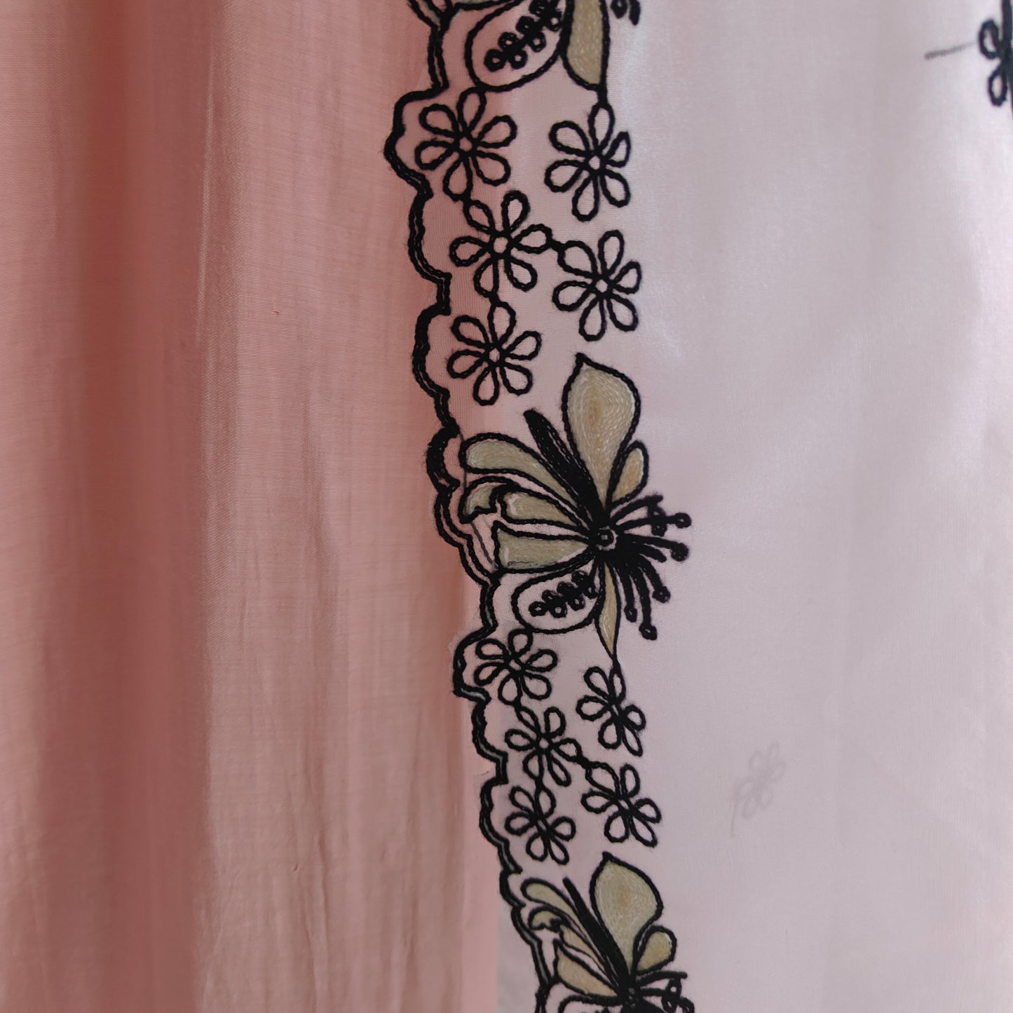 Peach pink tissue dress material with black embroidery