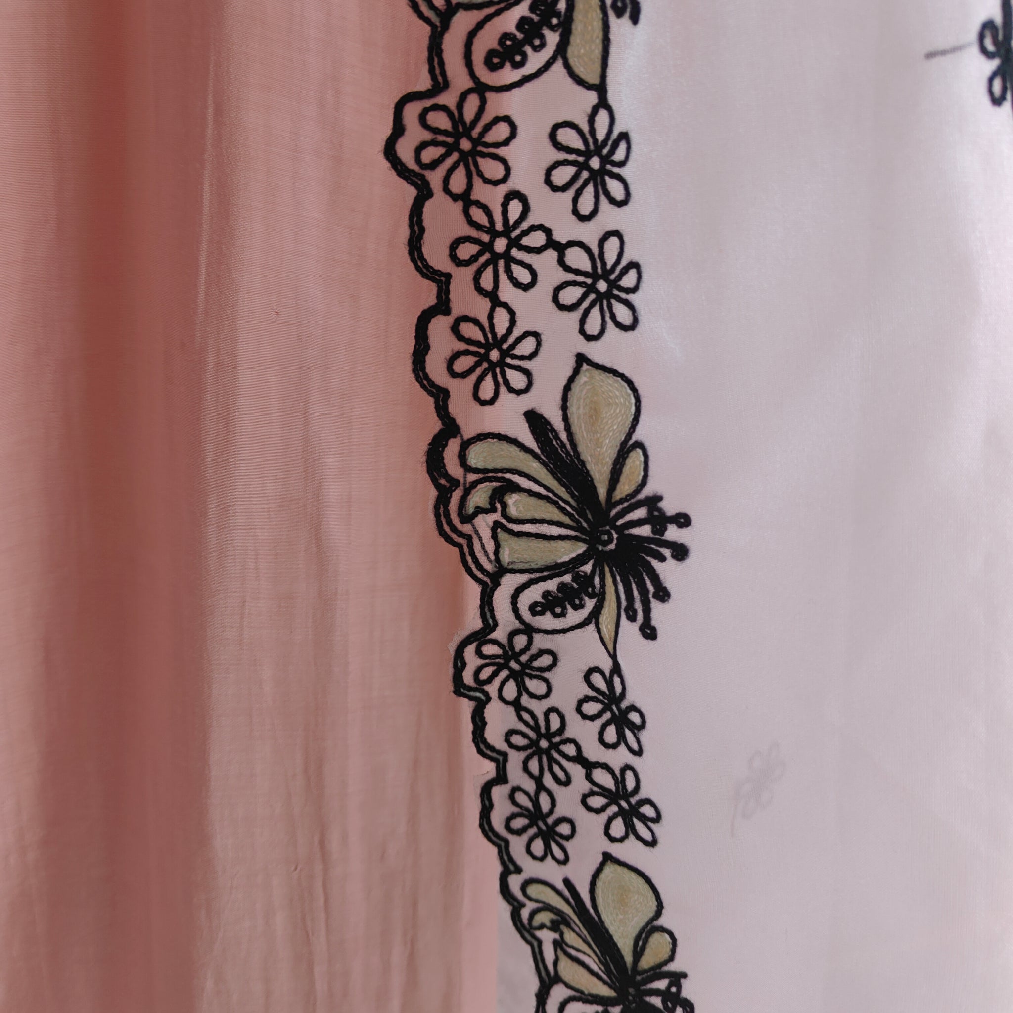 Peach pink tissue dress material with black embroidery