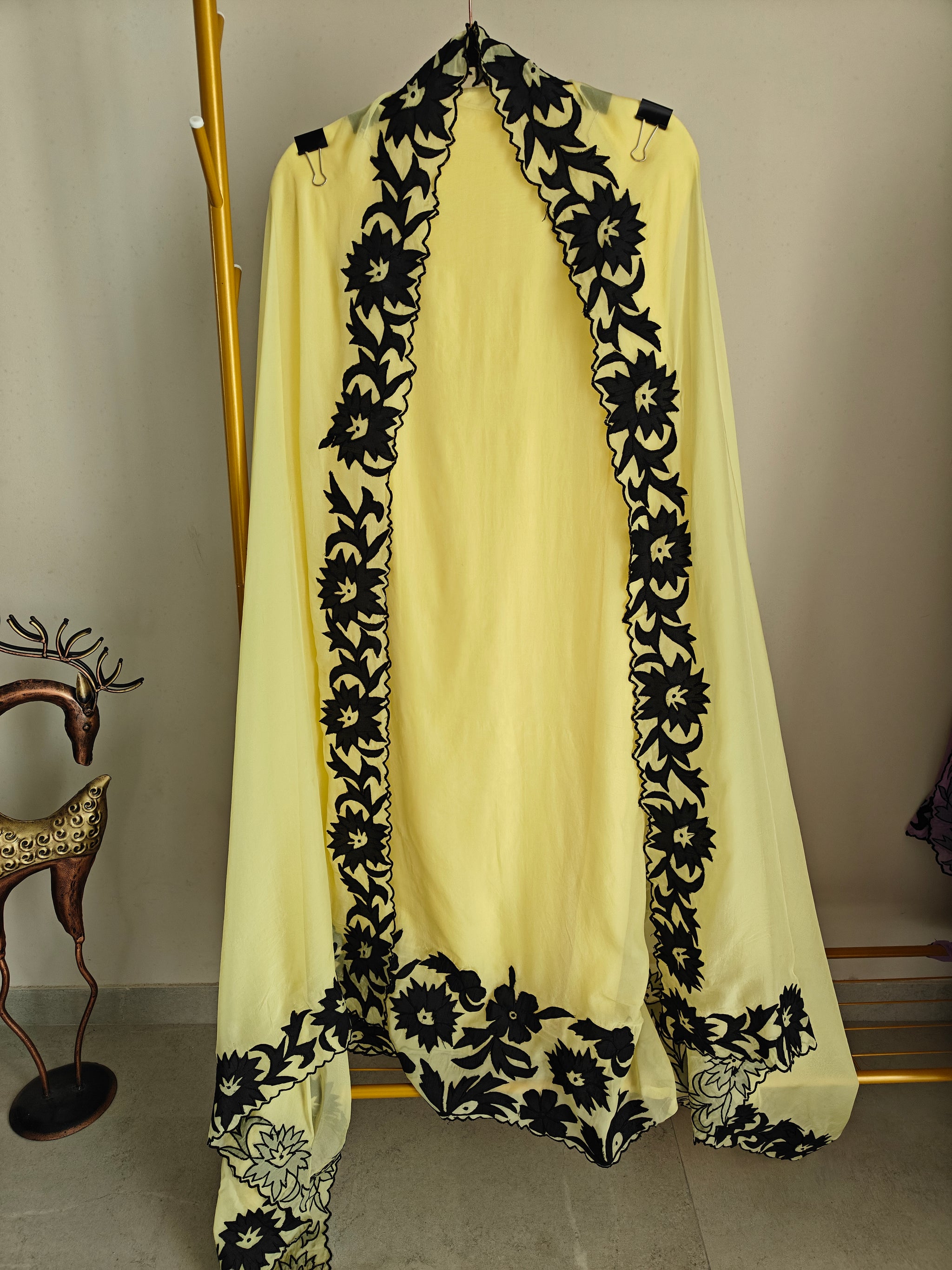 Yellow Georgette dress material with Black patchwork