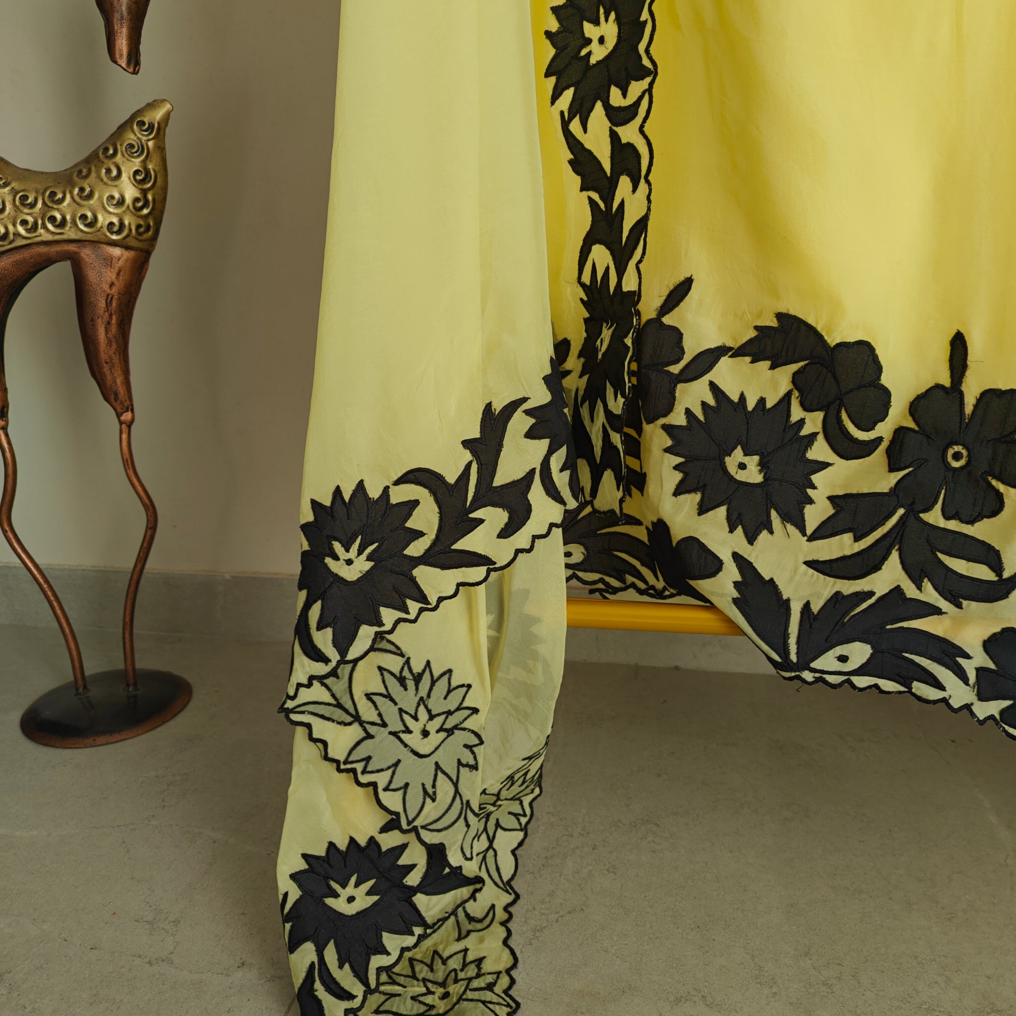 Yellow Georgette dress material with Black patchwork