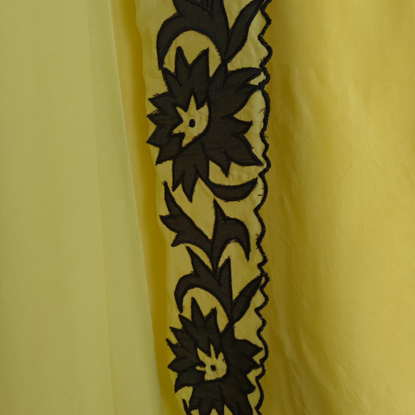 Yellow Georgette dress material with Black patchwork