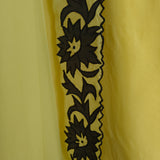 Yellow Georgette dress material with Black patchwork