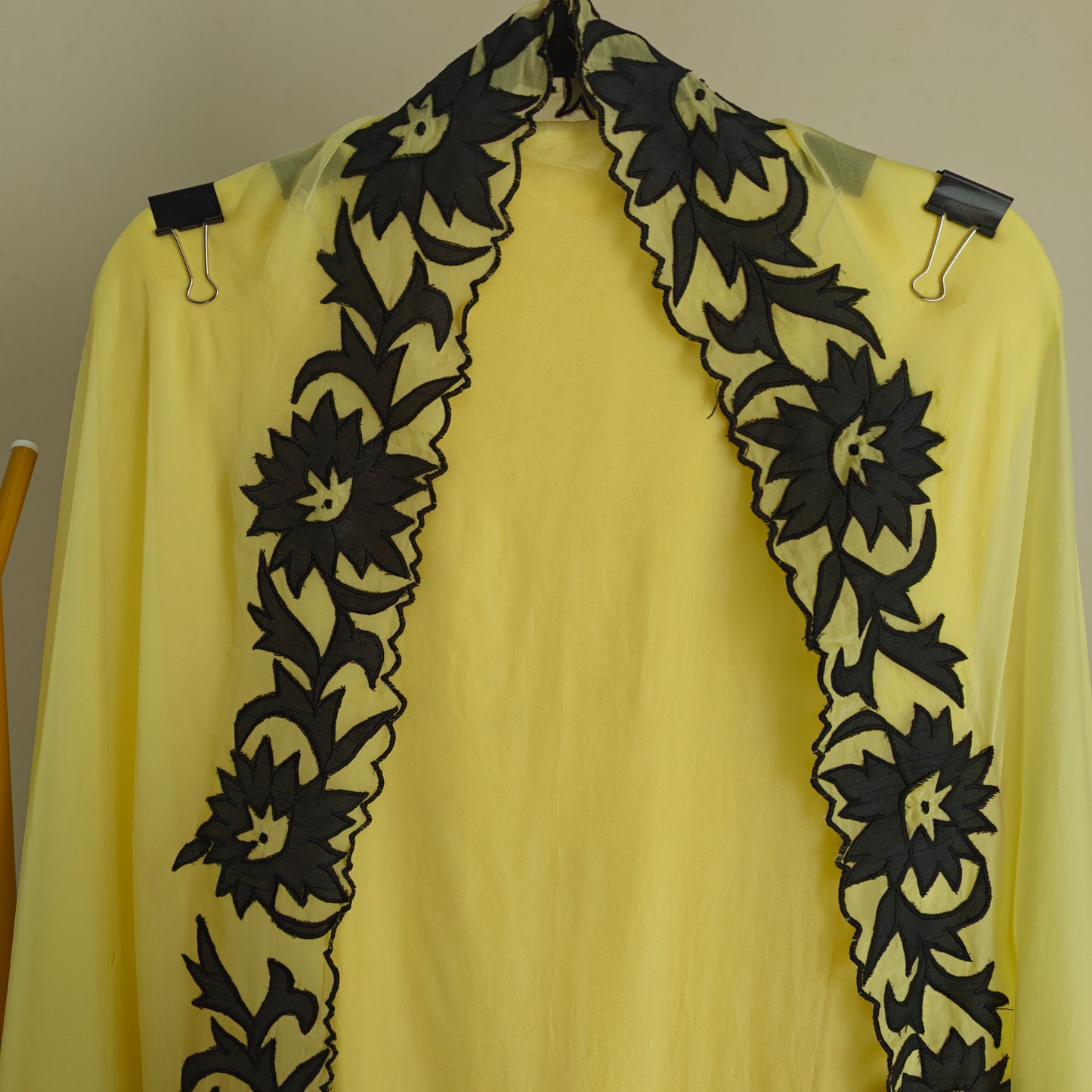 Yellow Georgette dress material with Black patchwork