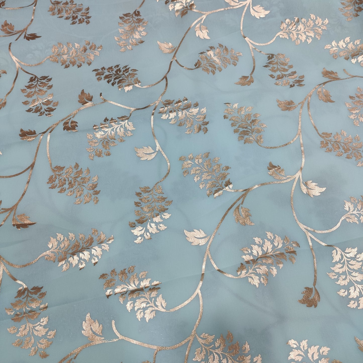 Sage green georgette with golden foil work fabric