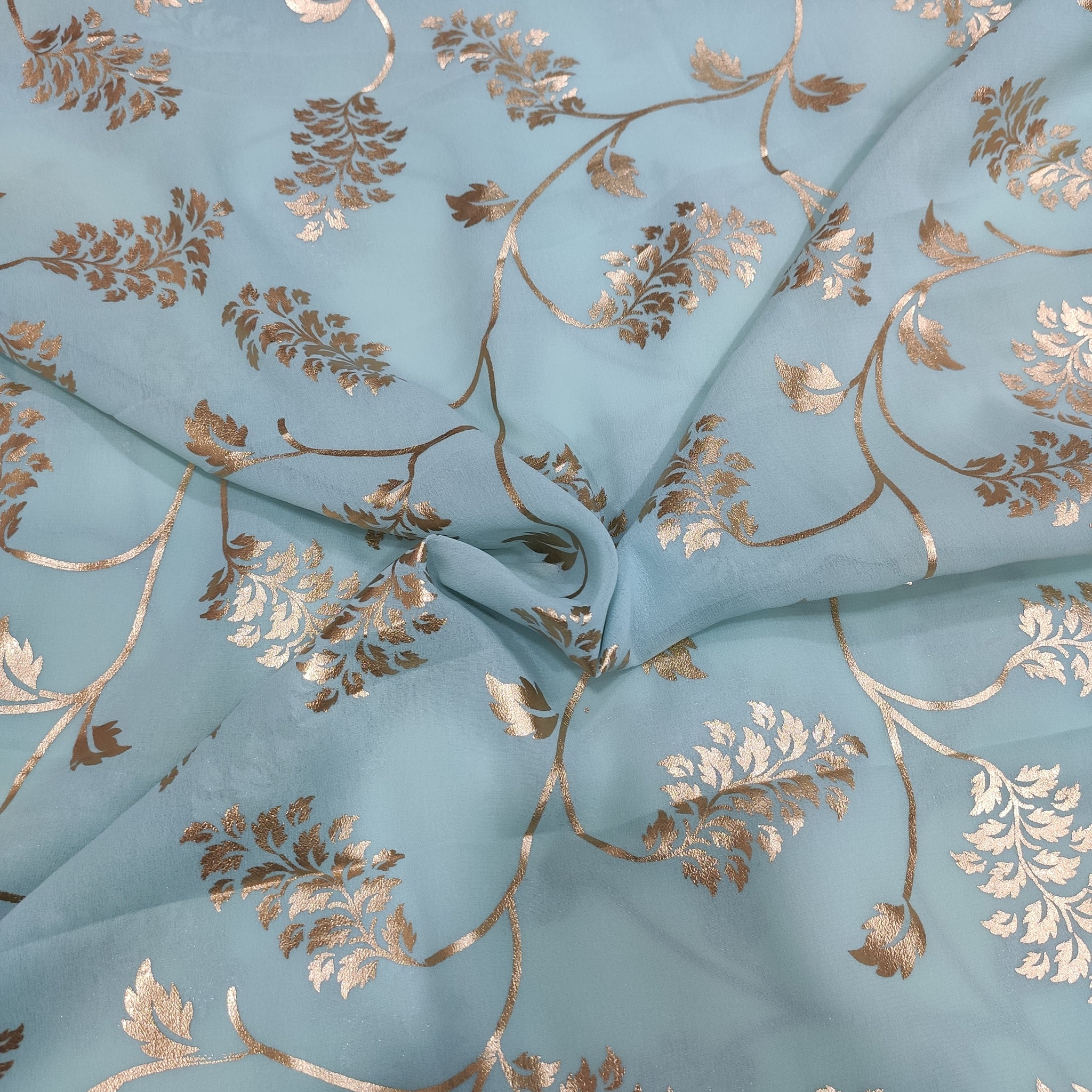 Sage green georgette with golden foil work fabric