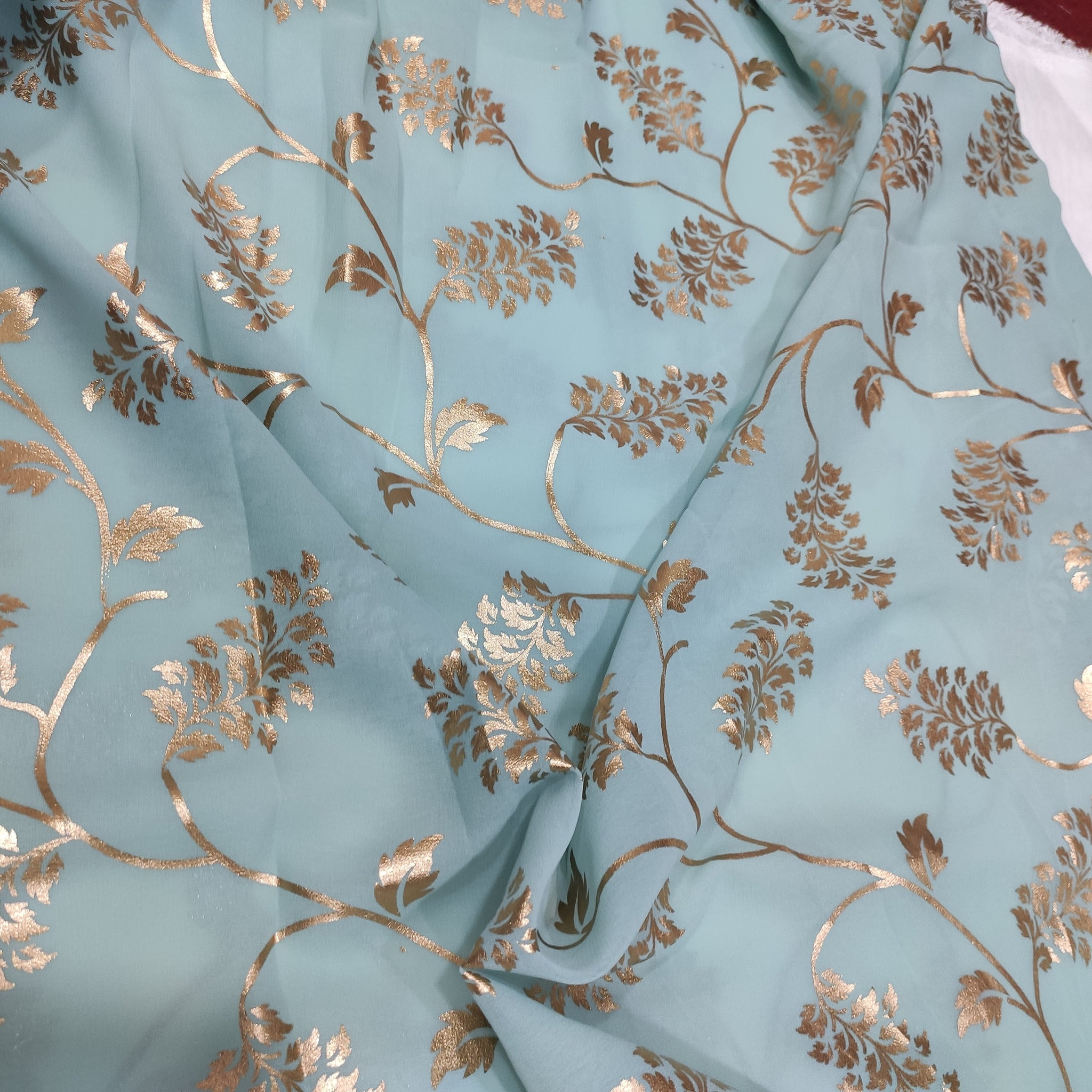 Sage green georgette with golden foil work fabric