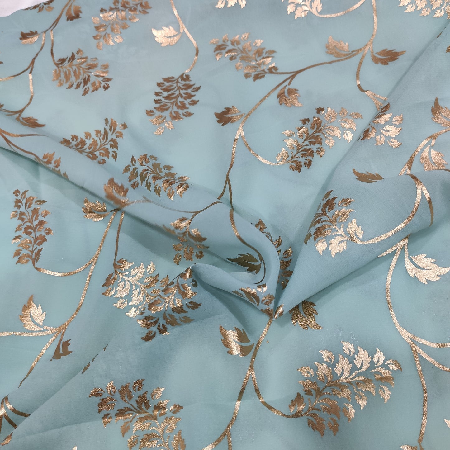 Sage green georgette with golden foil work fabric