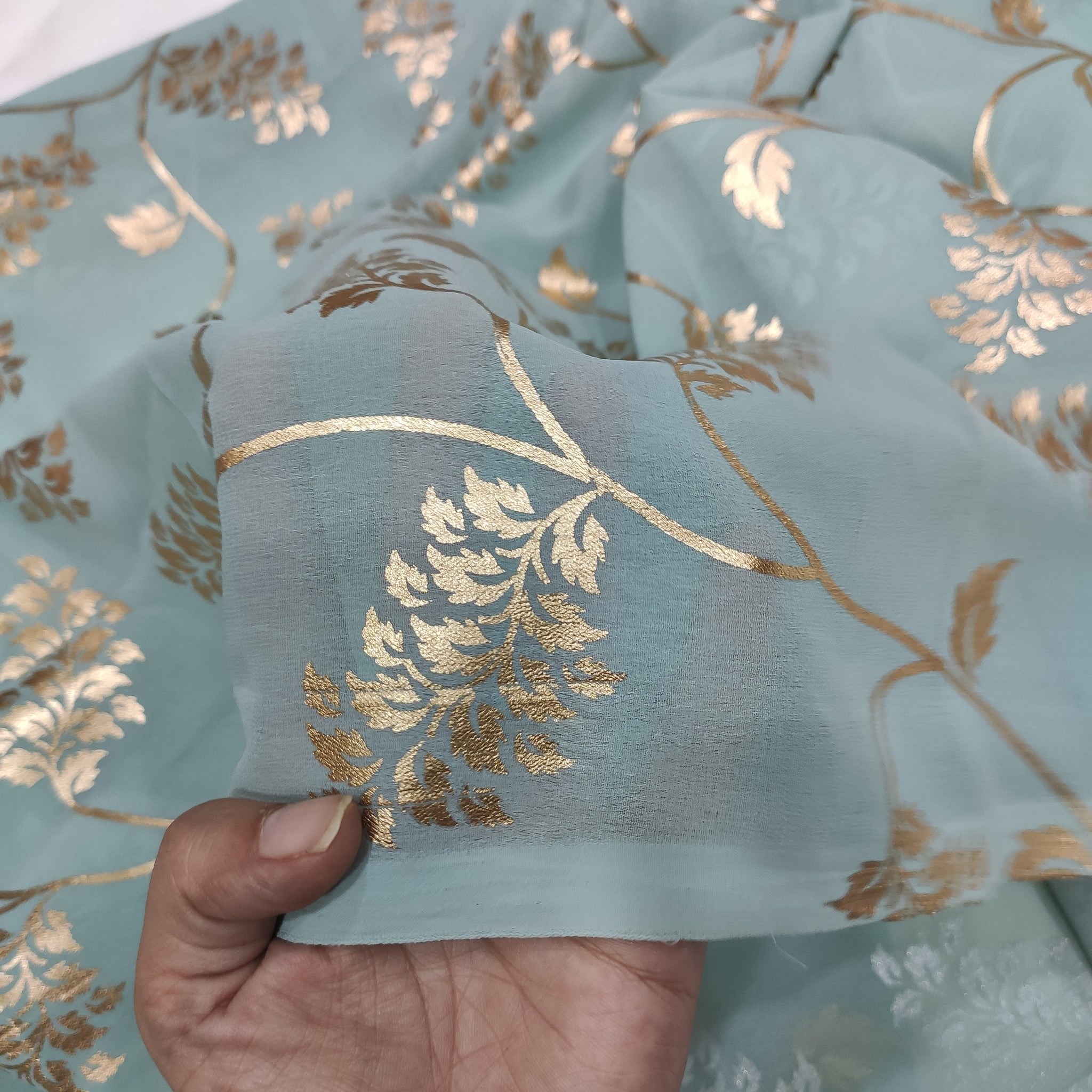 Sage green georgette with golden foil work fabric
