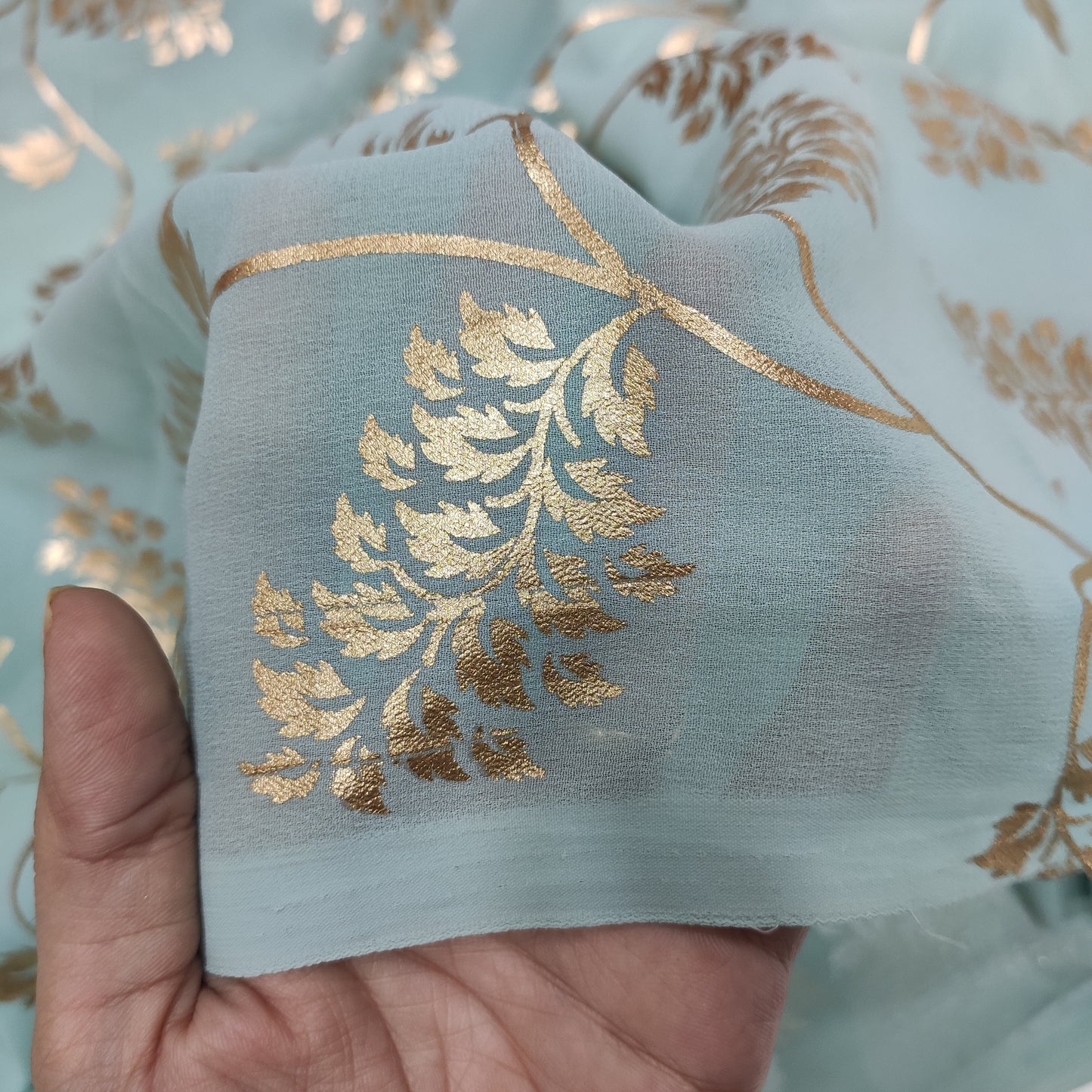 Sage green georgette with golden foil work fabric