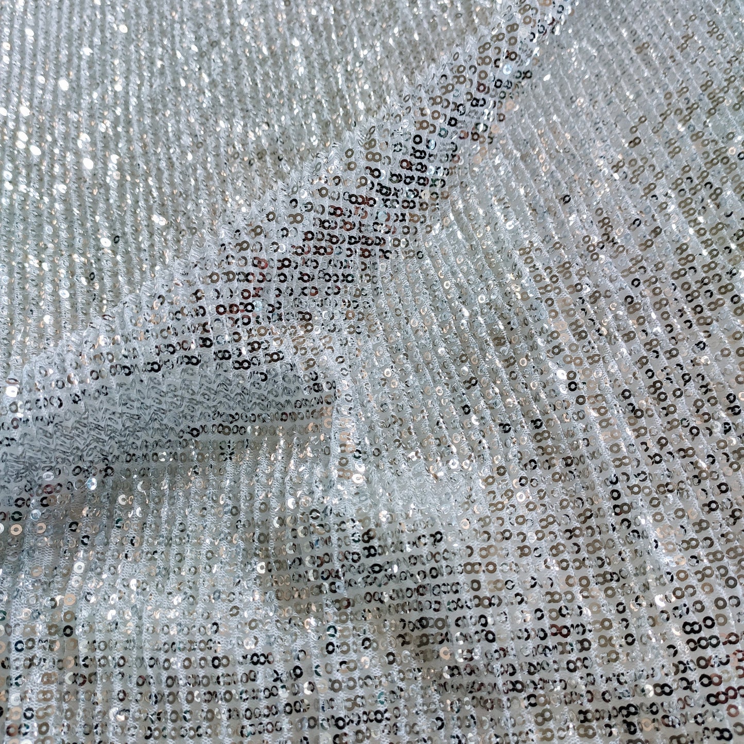 Silver white Sequin embroidered on Imported Lycra net