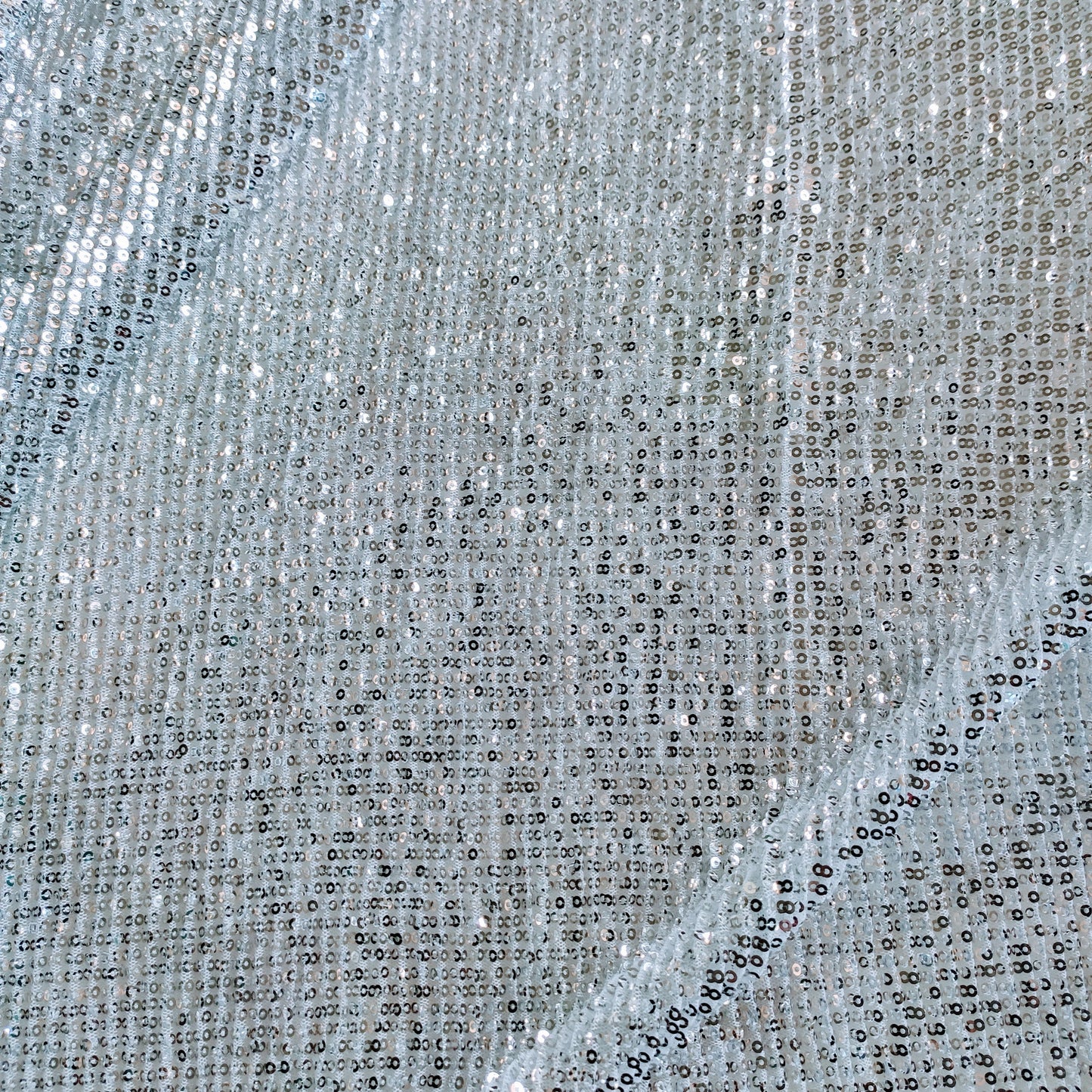 Silver white Sequin embroidered on Imported Lycra net