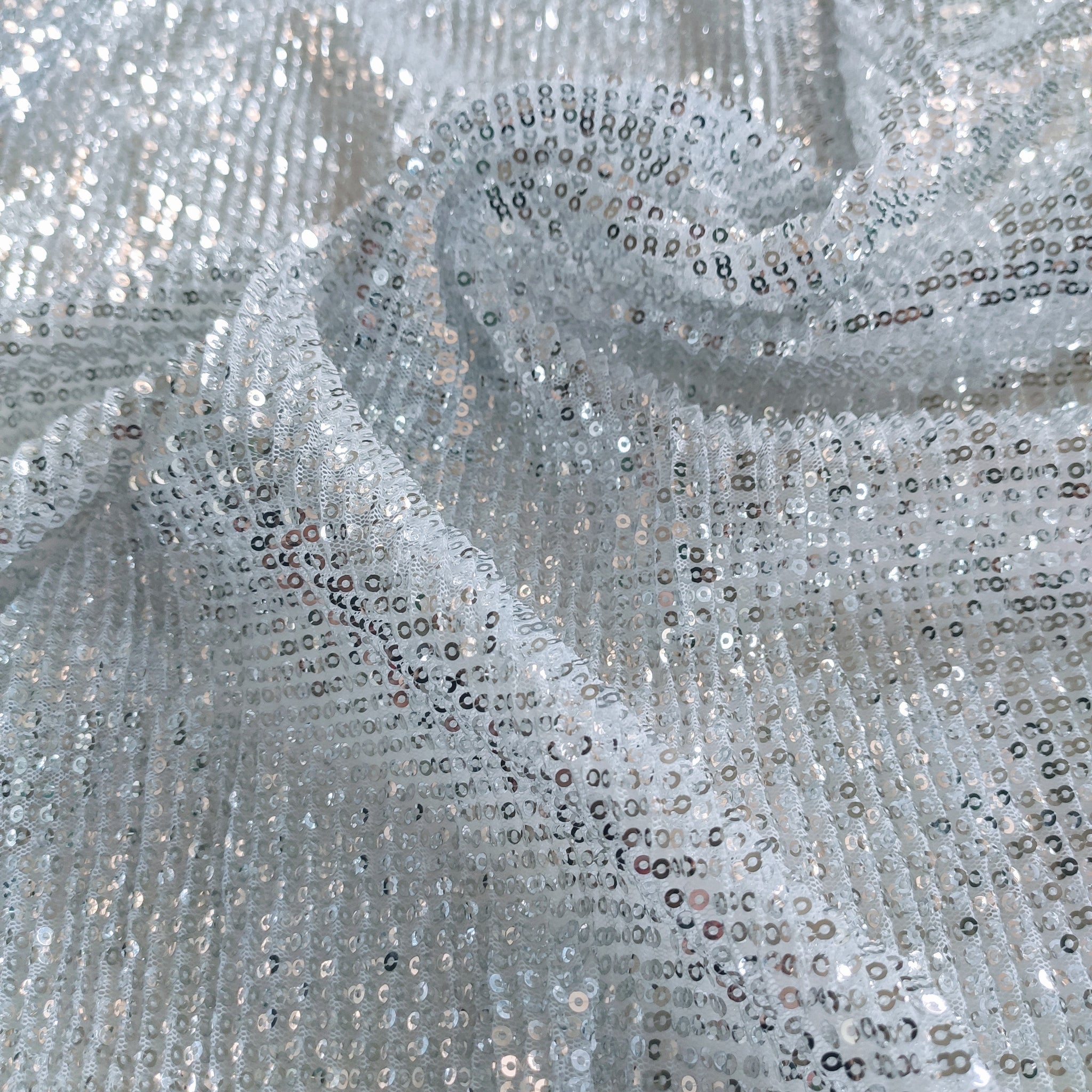 Silver white Sequin embroidered on Imported Lycra net