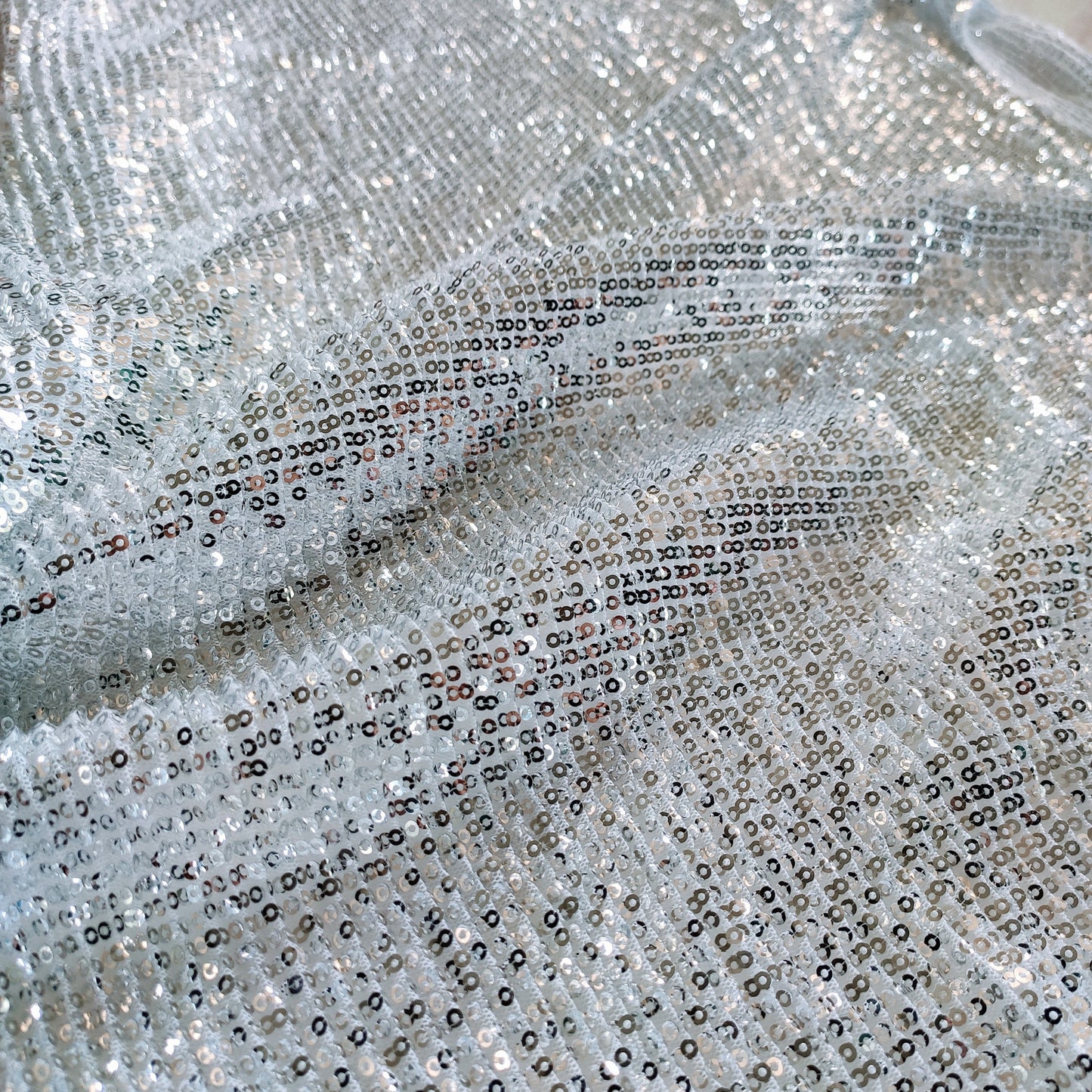 Silver white Sequin embroidered on Imported Lycra net