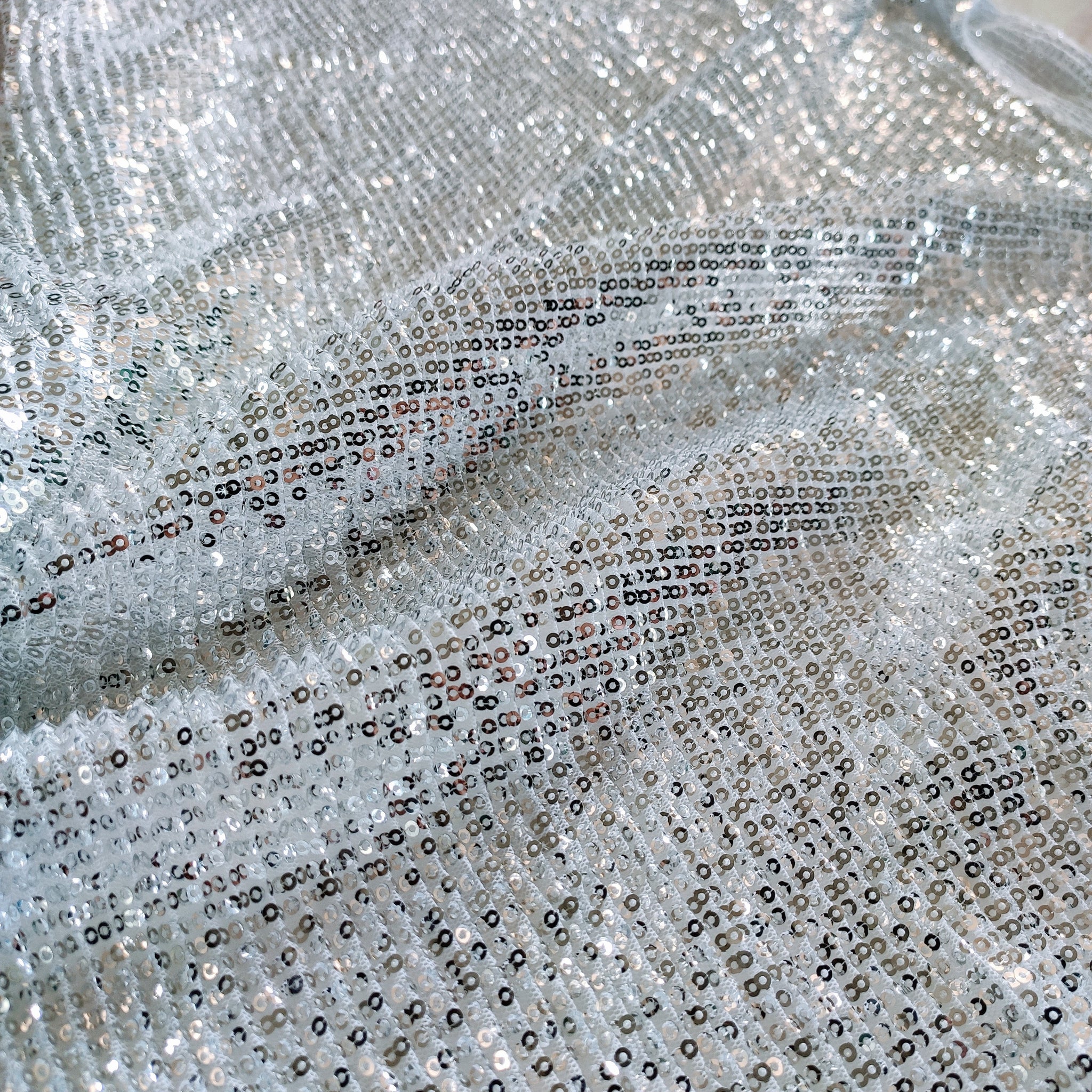 Silver white Sequin embroidered on Imported Lycra net