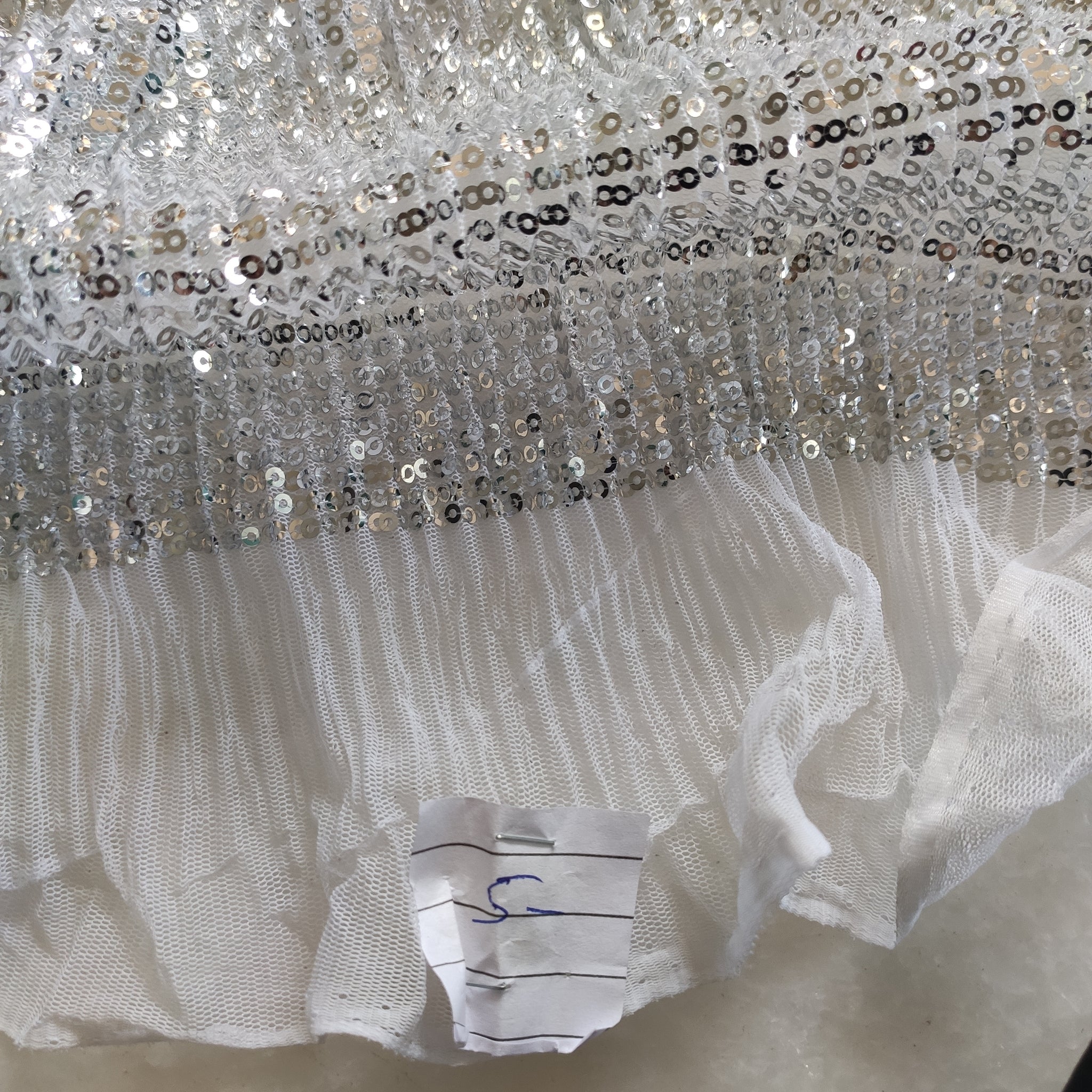 Silver white Sequin embroidered on Imported Lycra net