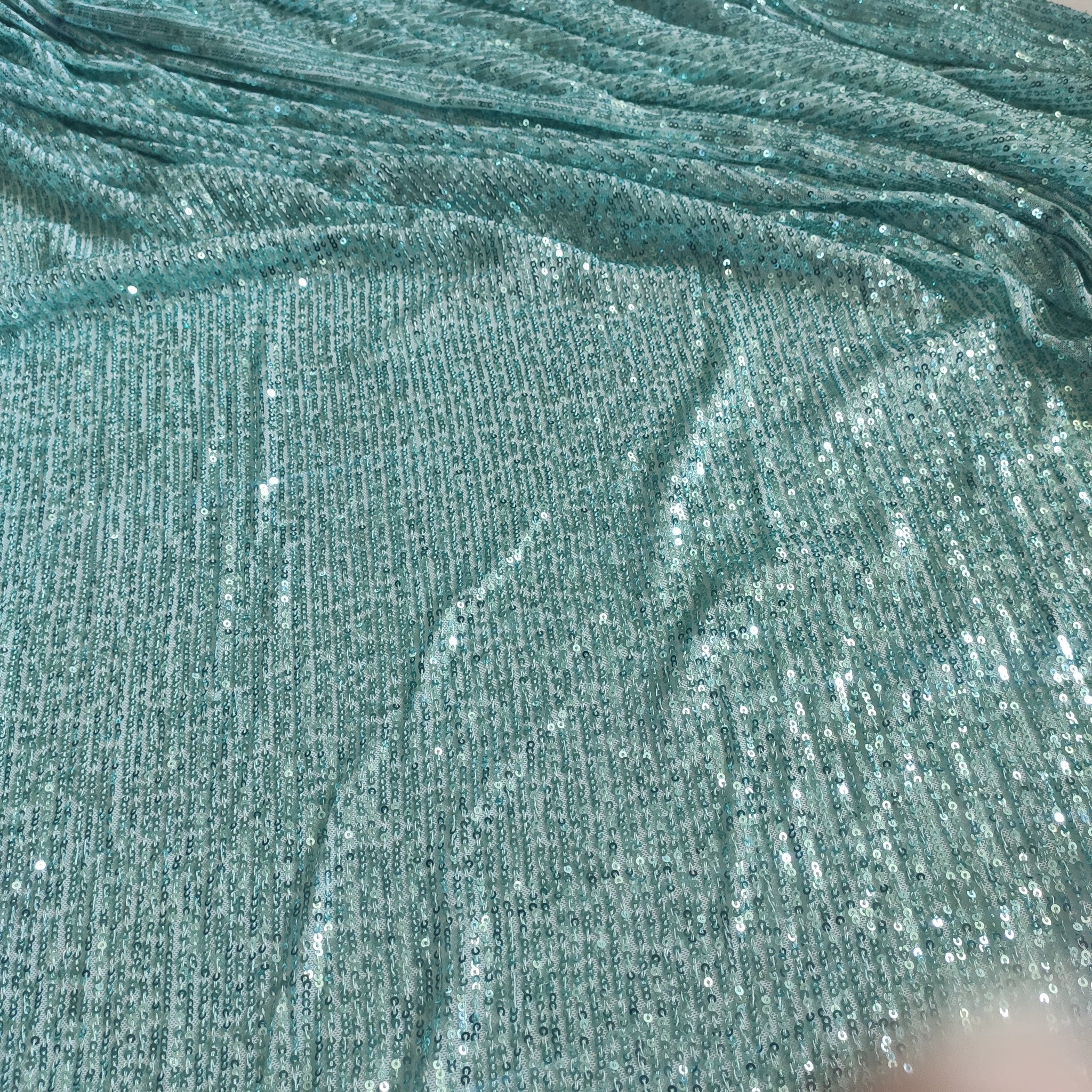Ice blue Sequin embroidered on Imported Lycra net
