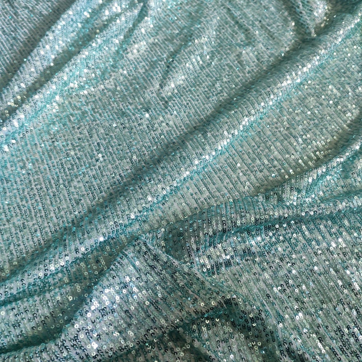 Ice blue Sequin embroidered on Imported Lycra net