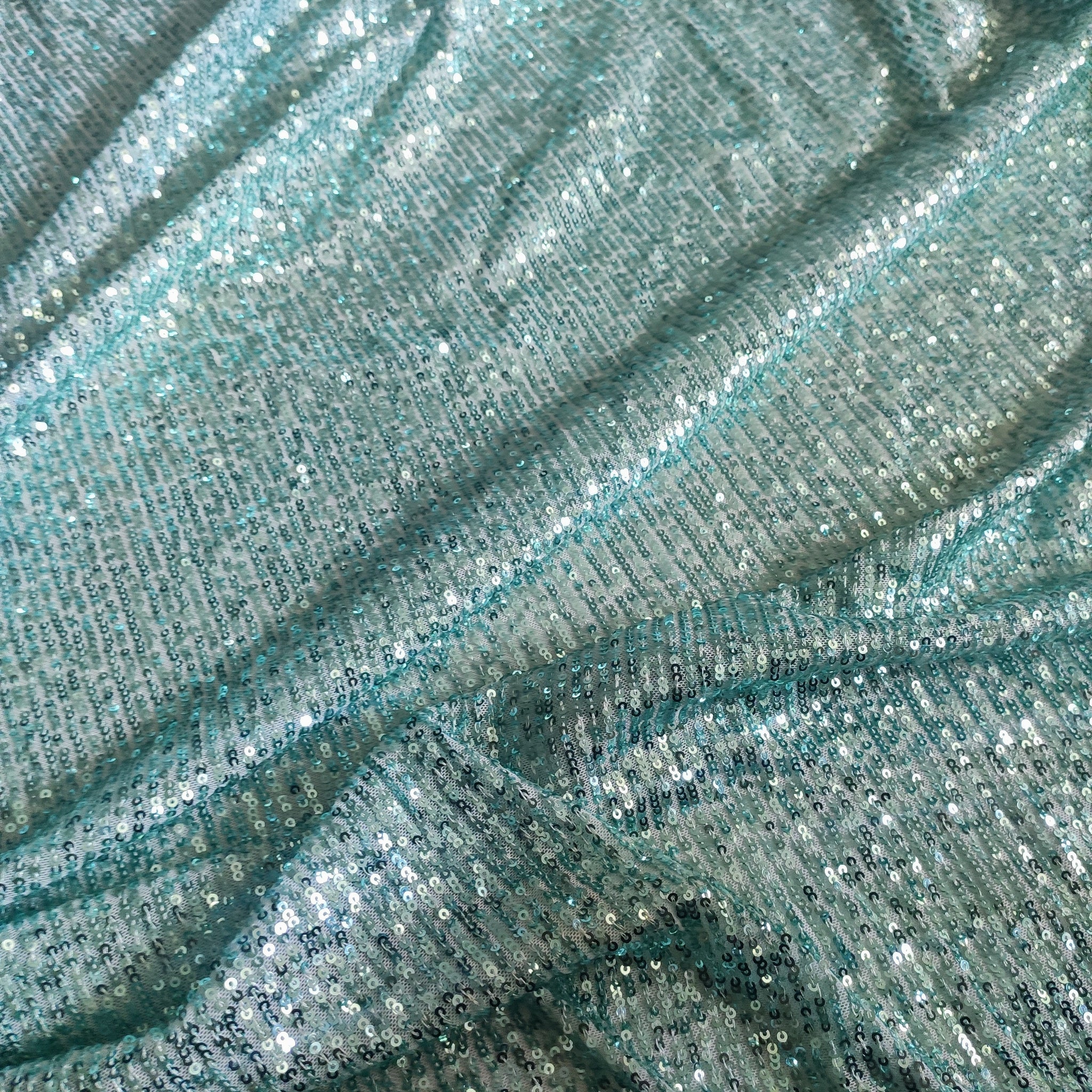 Ice blue Sequin embroidered on Imported Lycra net