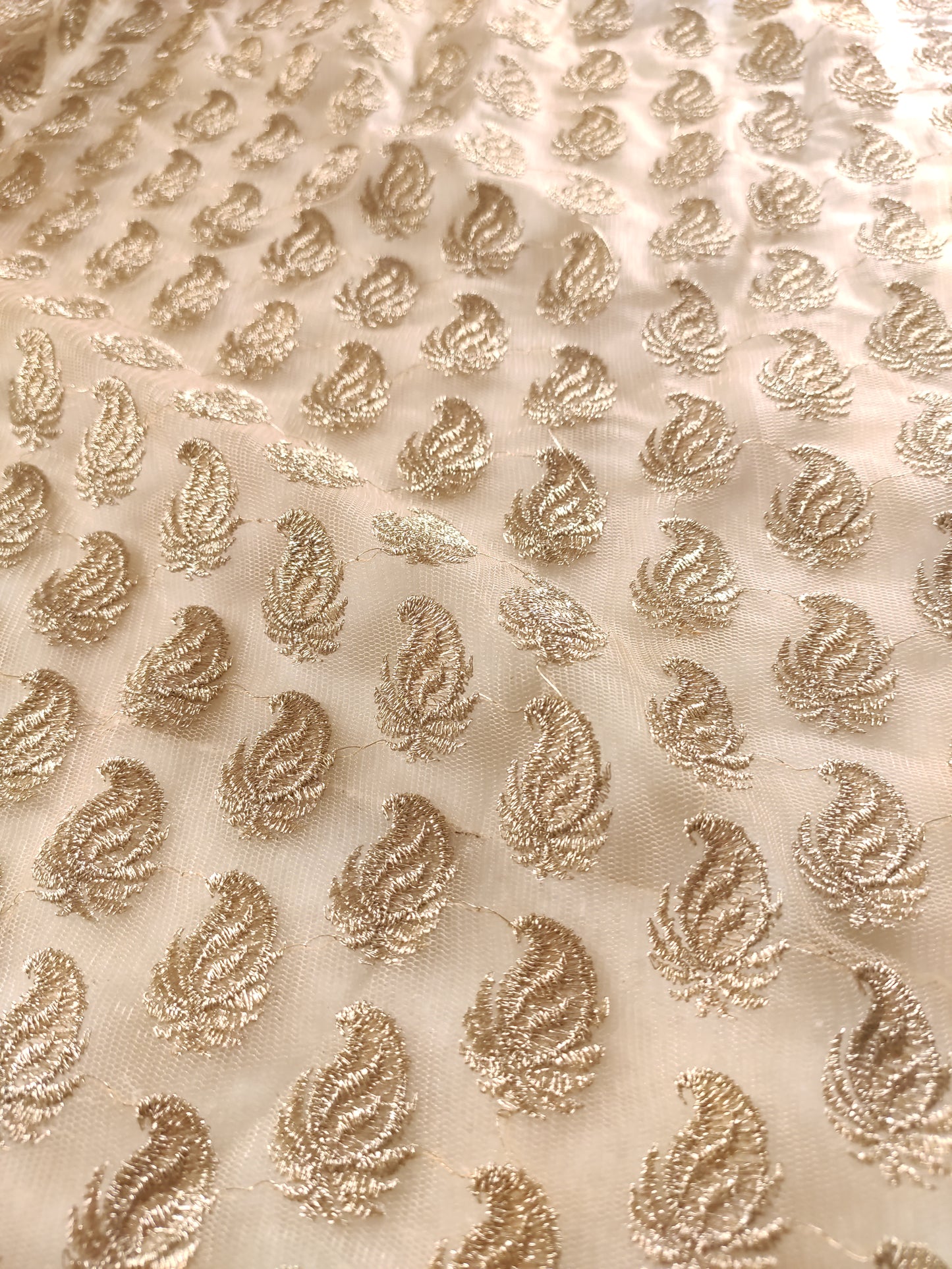 Golden net designer blouse fabric.