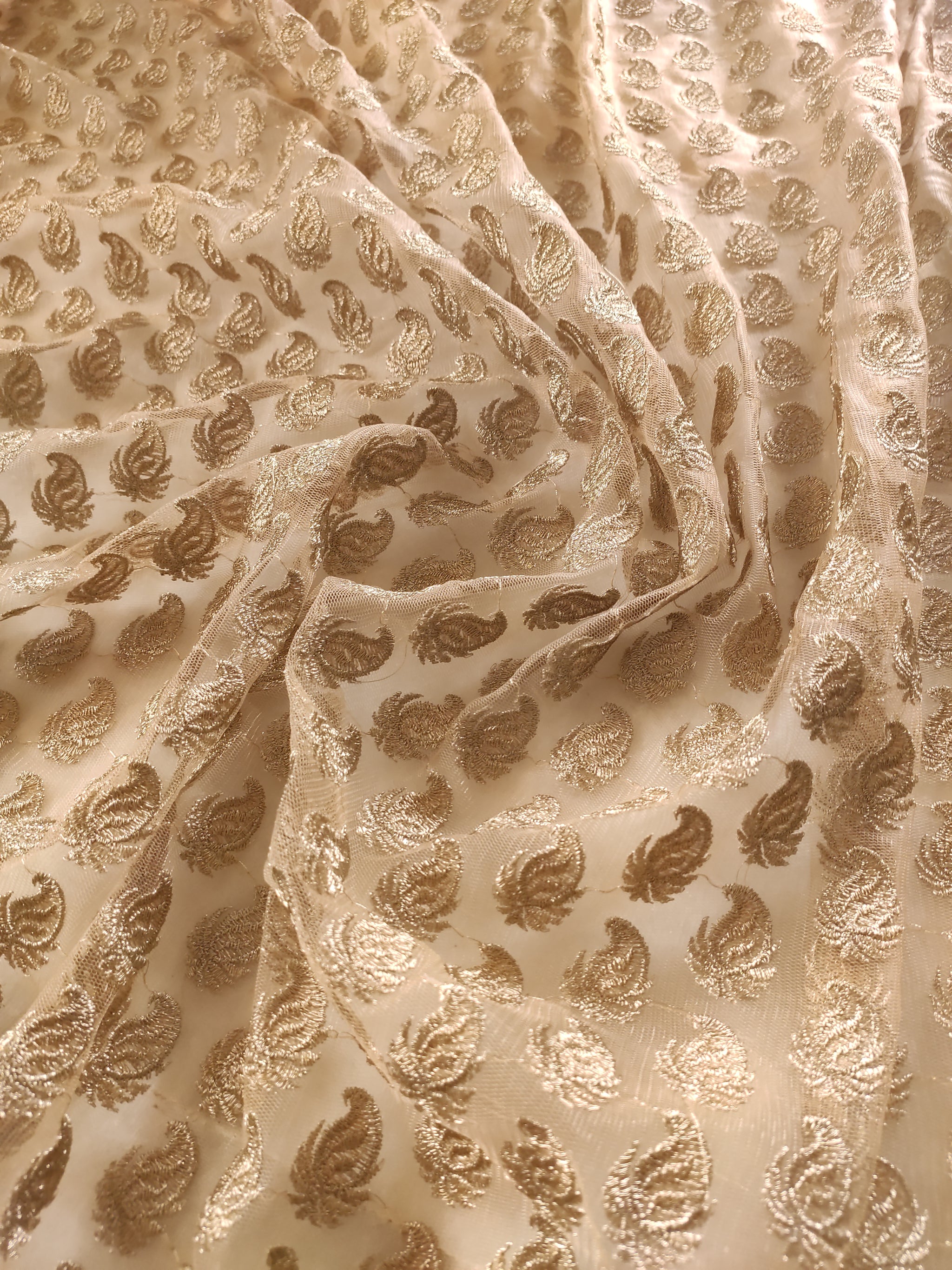Golden net designer blouse fabric.