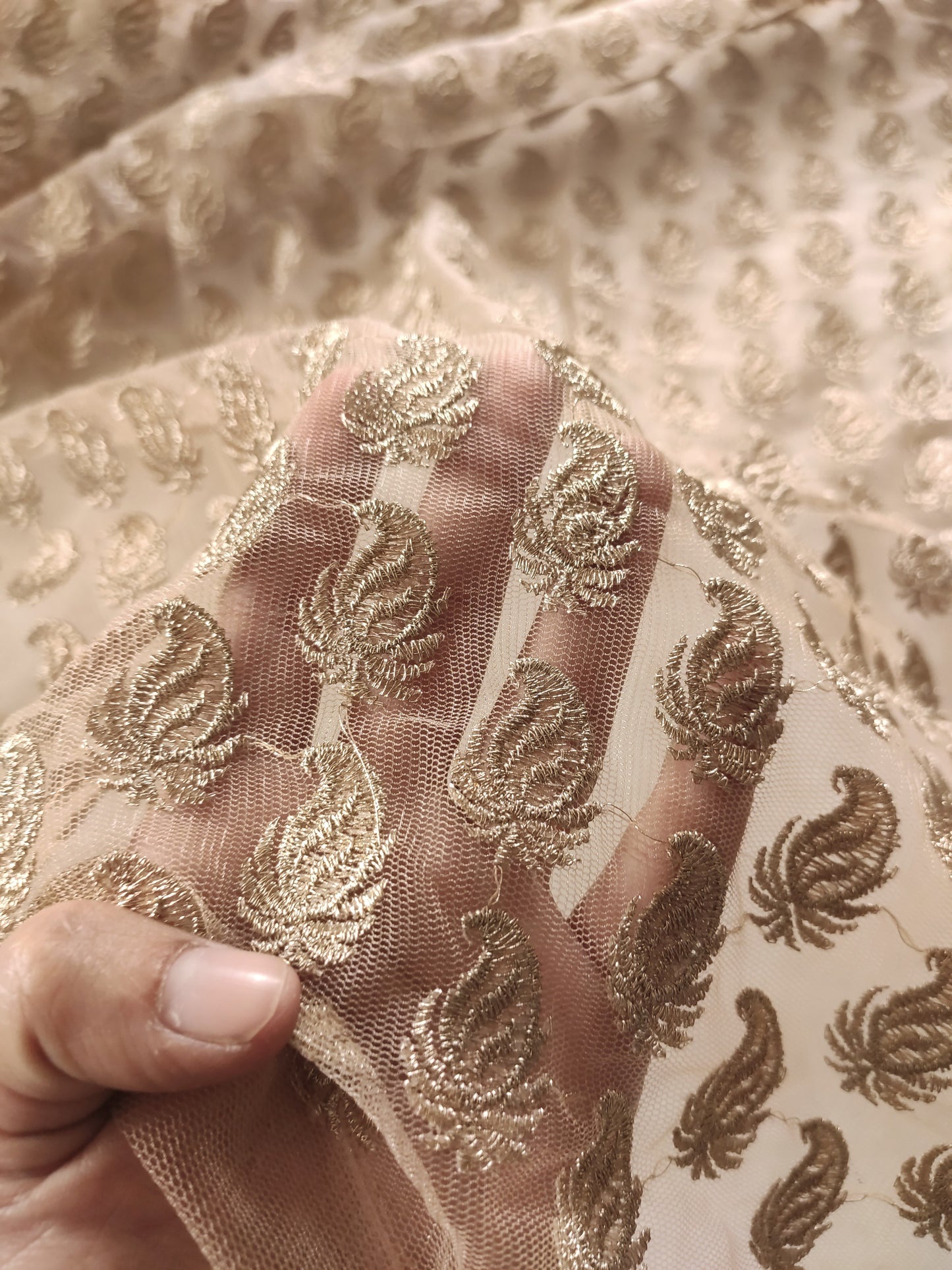 Golden net designer blouse fabric.
