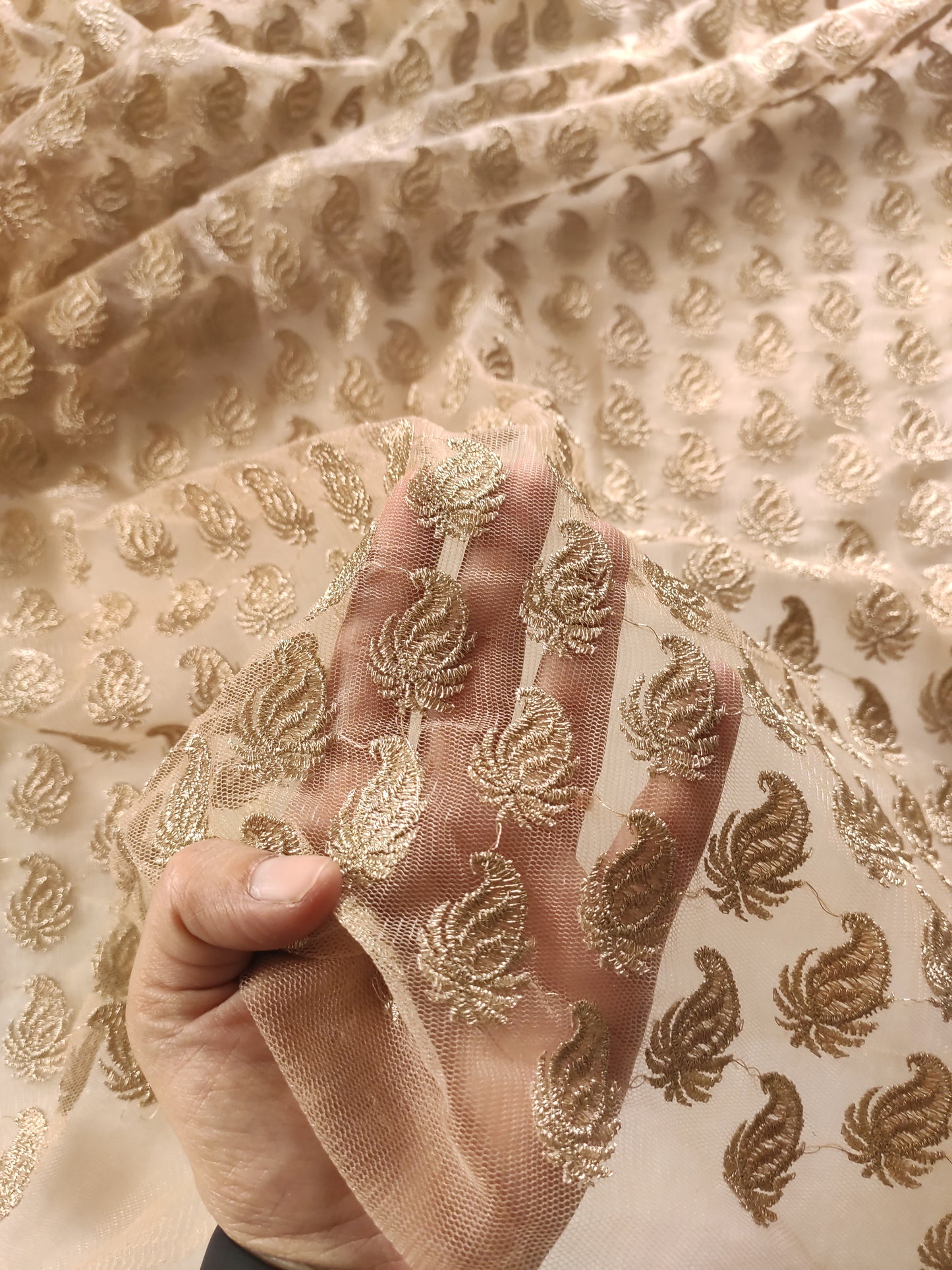 Golden net designer blouse fabric.