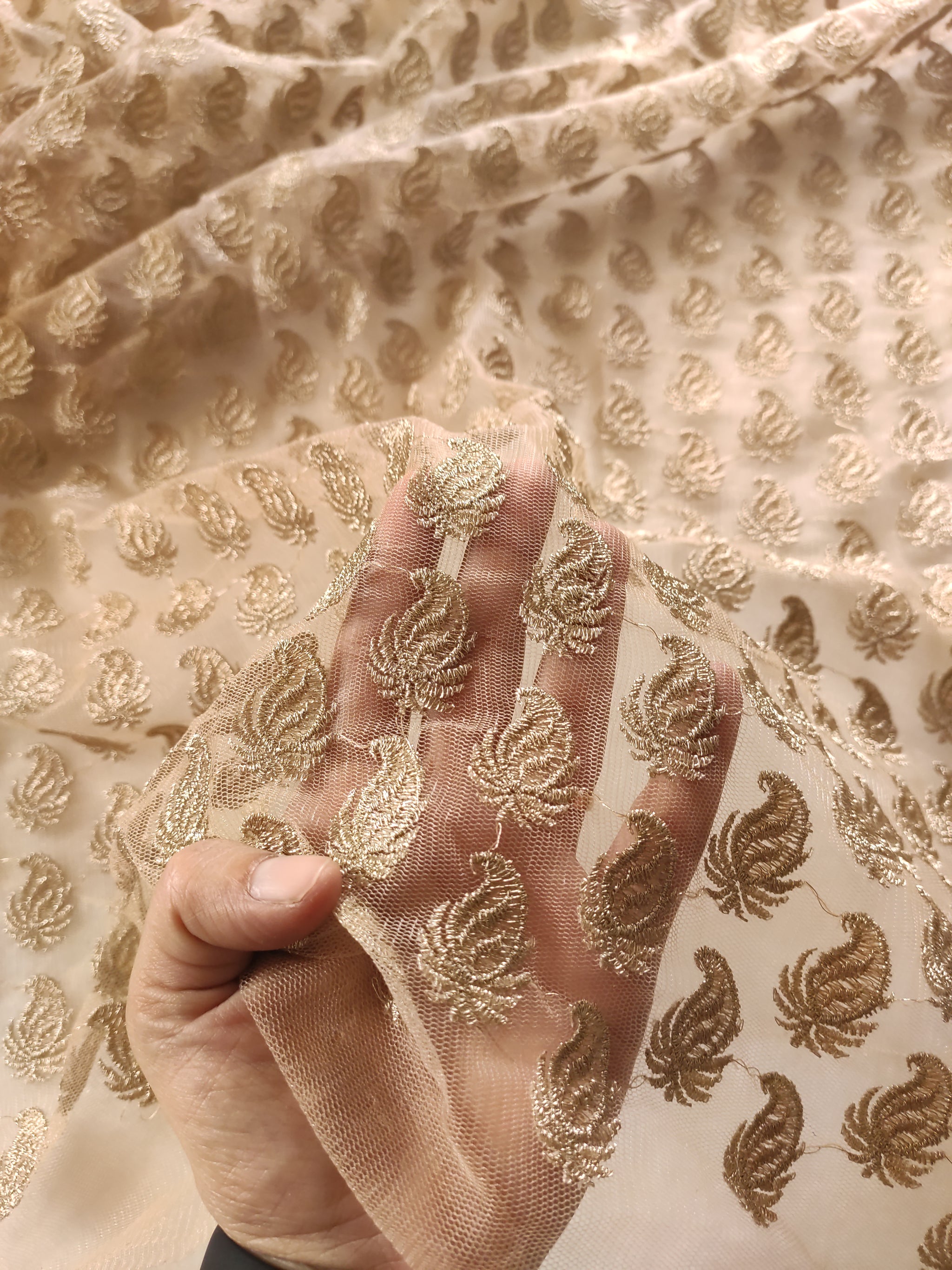 Golden net designer blouse fabric.