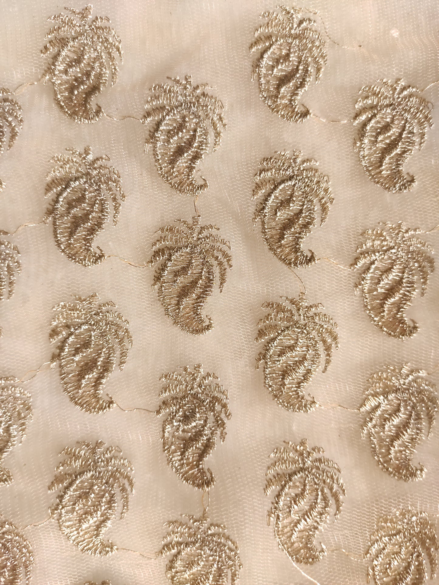 Golden net designer blouse fabric.