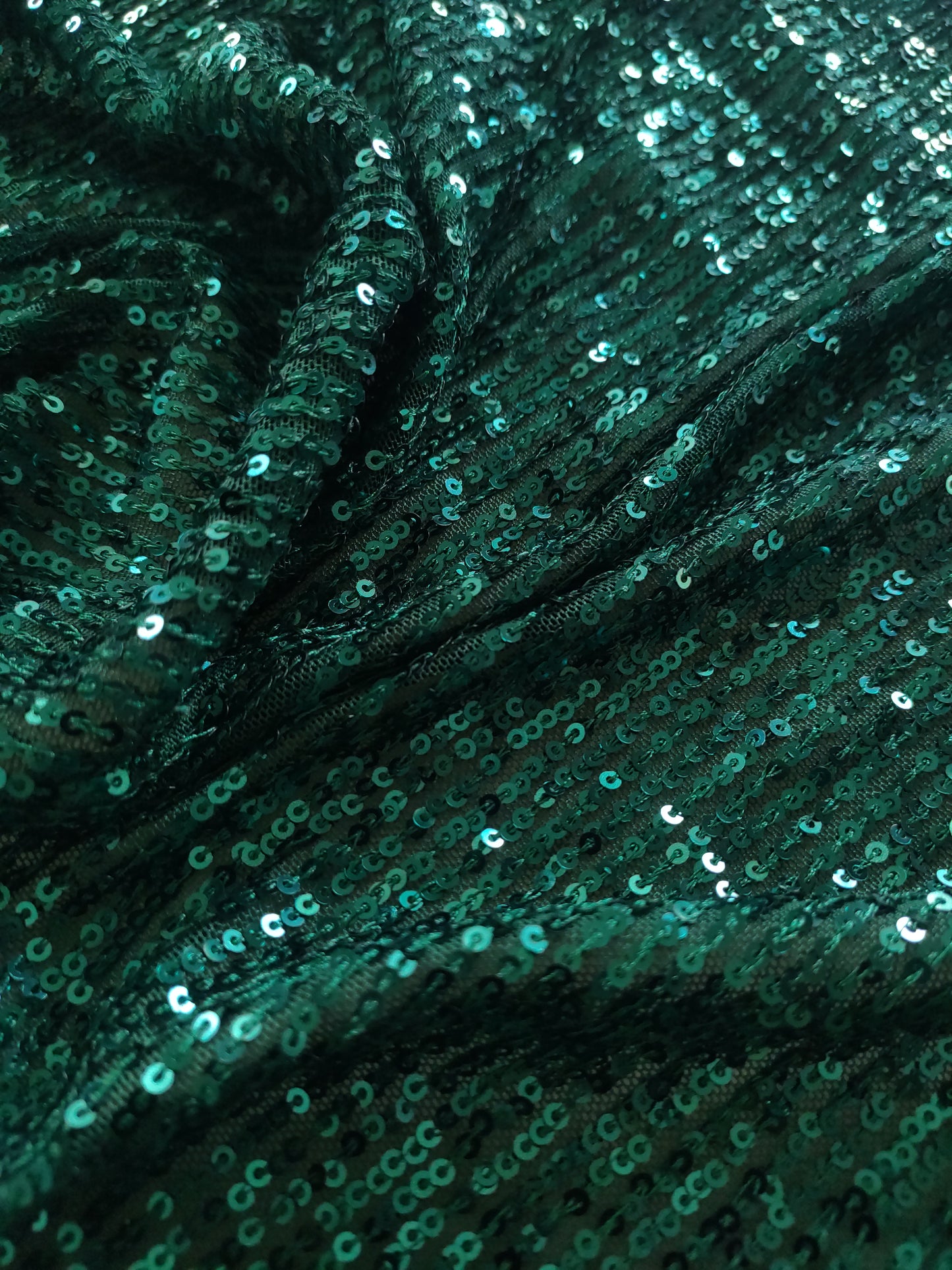 Bottle Green Sequin embroidered on Imported Lycra net