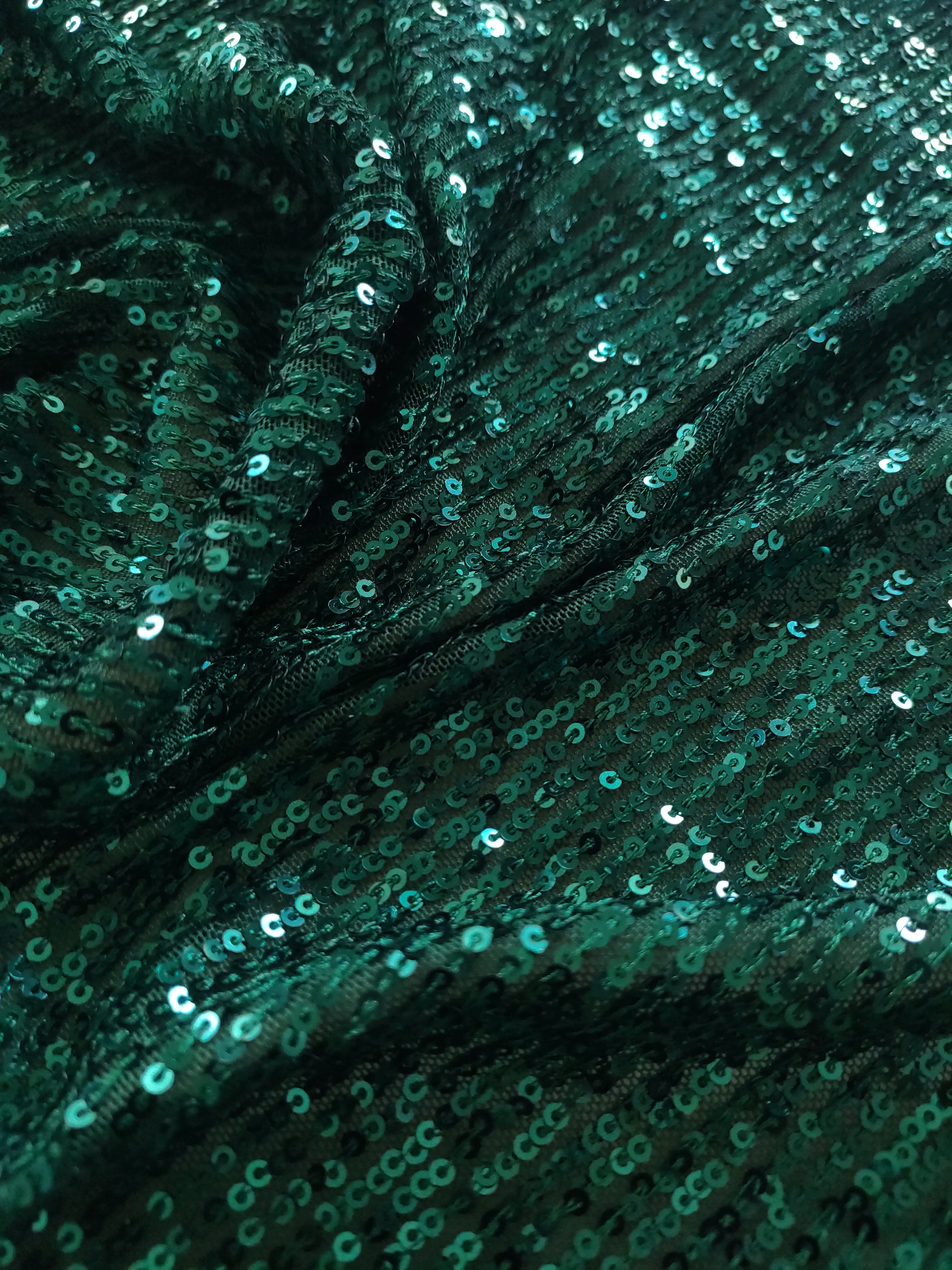 Bottle Green Sequin embroidered on Imported Lycra net
