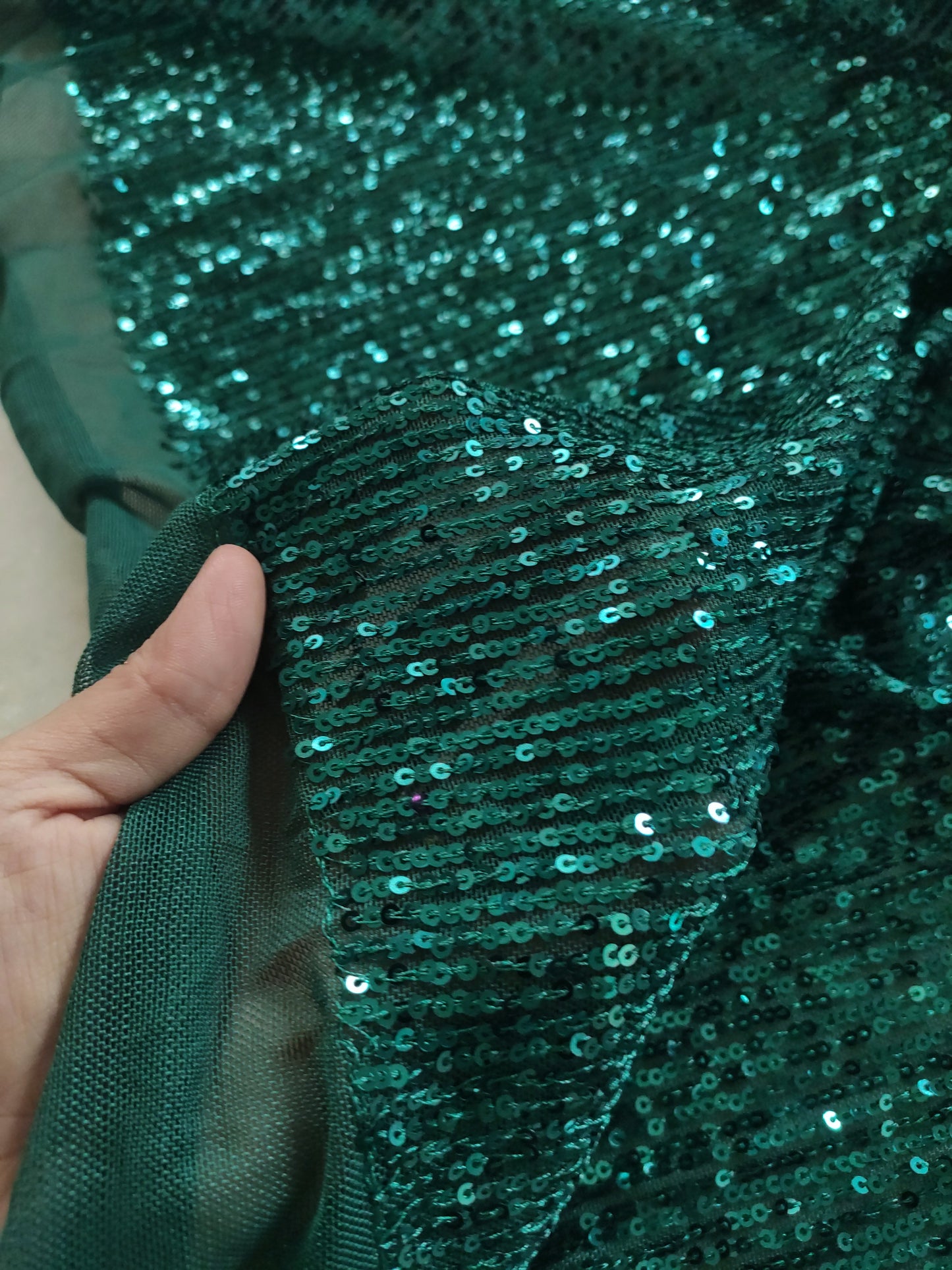 Bottle Green Sequin embroidered on Imported Lycra net
