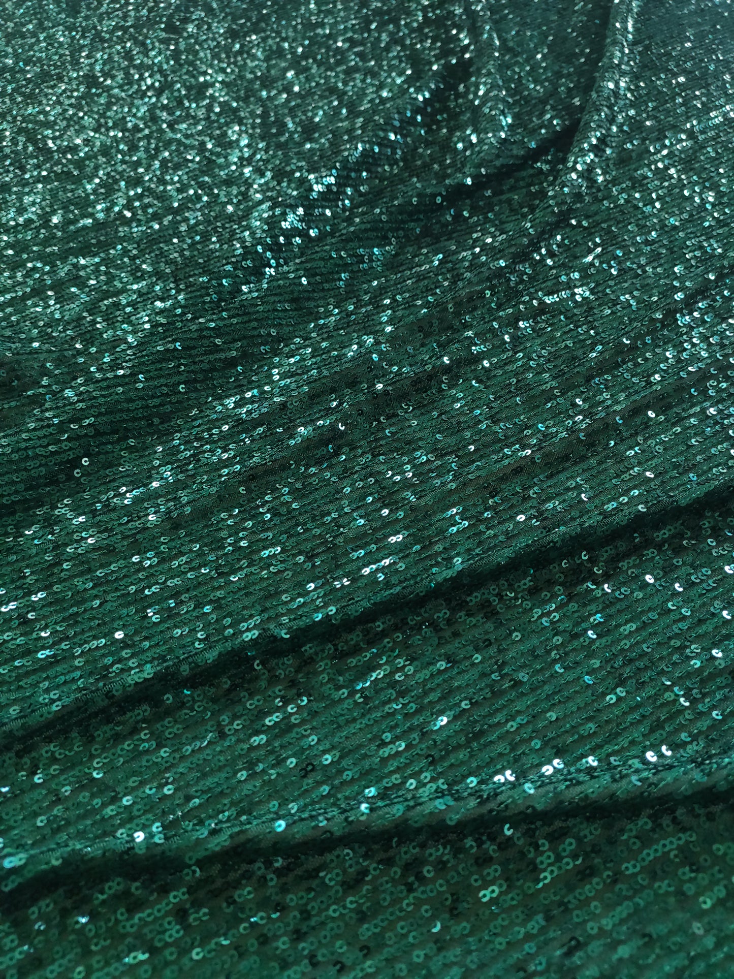 Bottle Green Sequin embroidered on Imported Lycra net