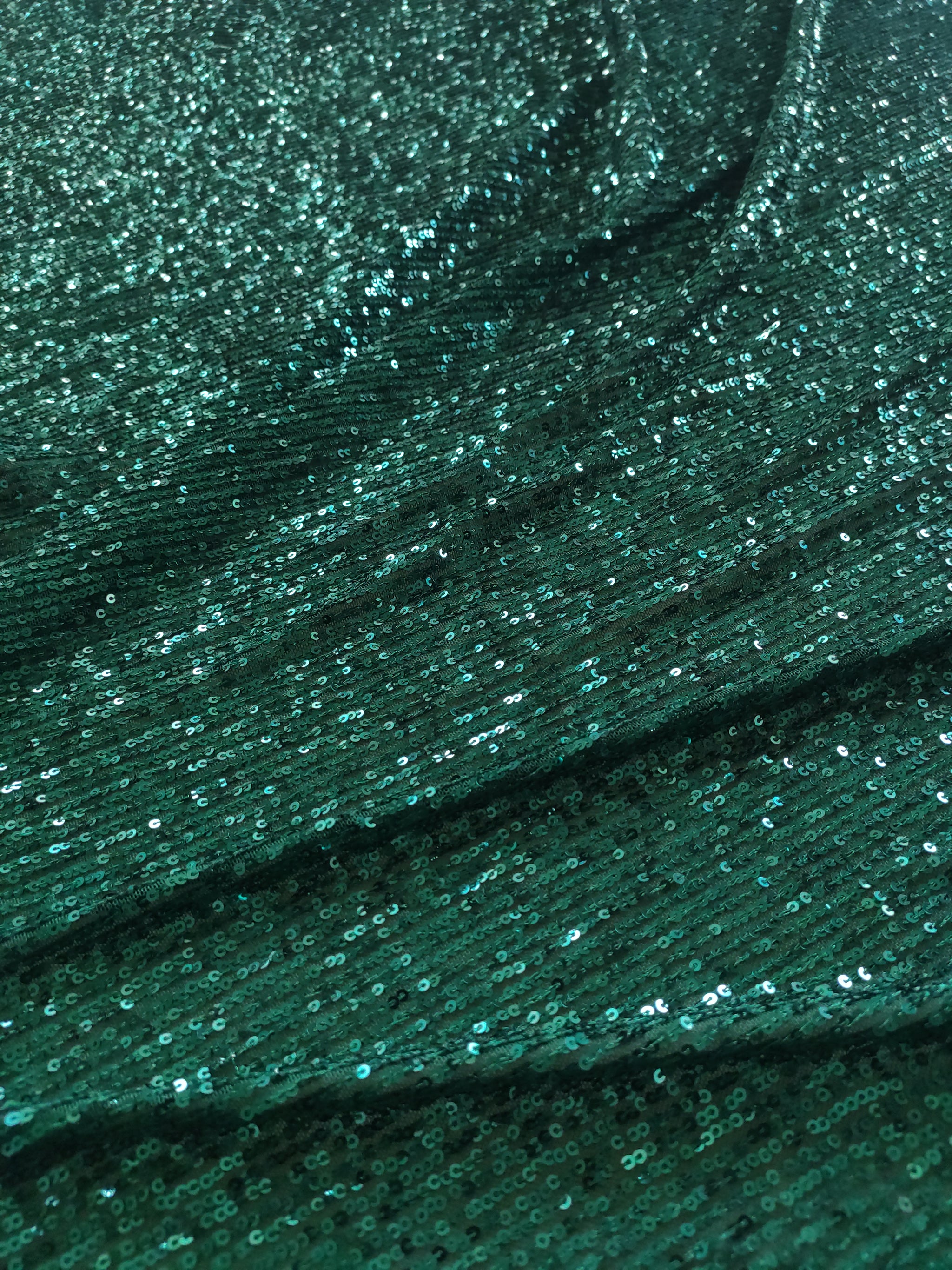 Bottle Green Sequin embroidered on Imported Lycra net