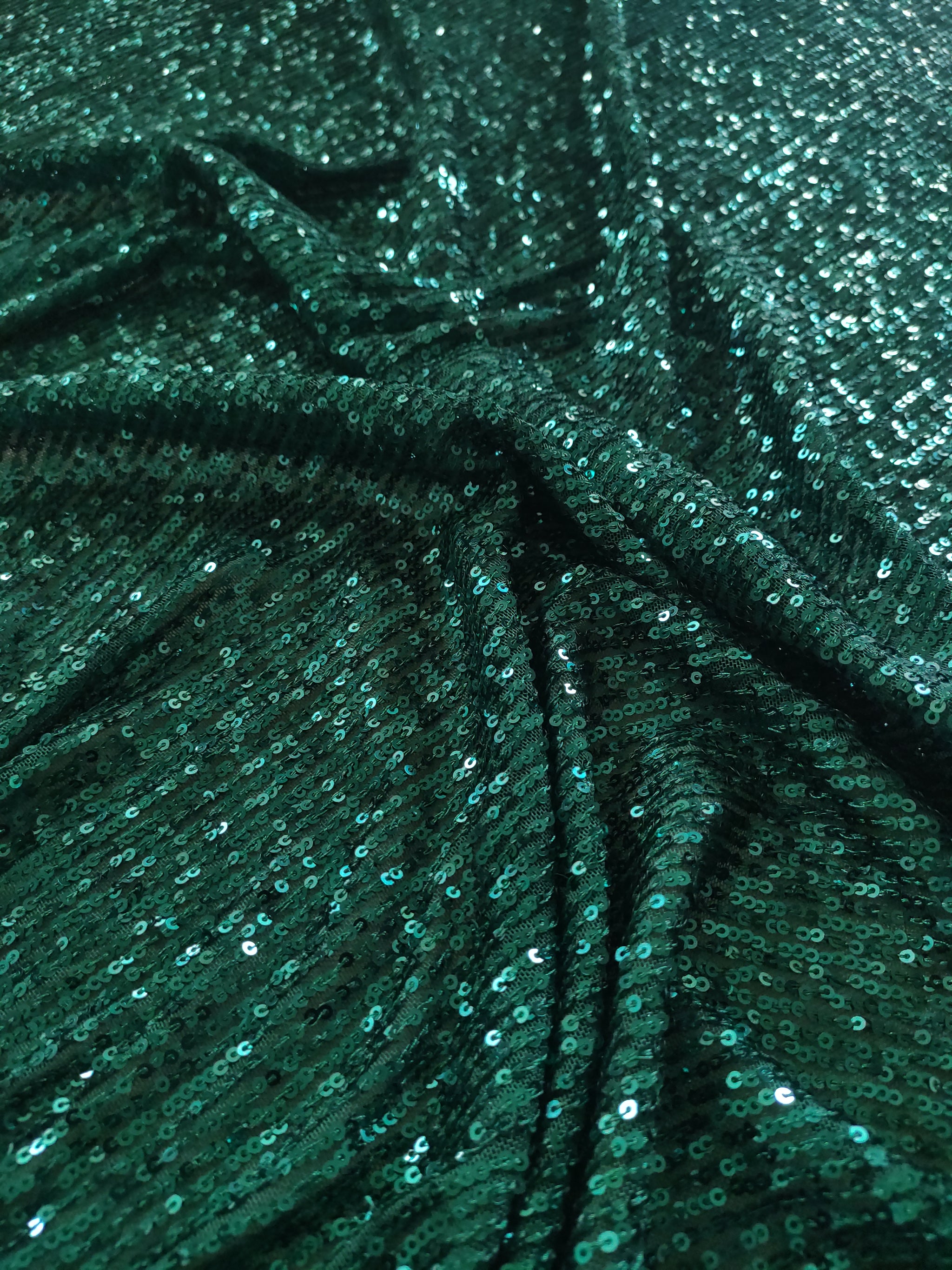 Bottle Green Sequin embroidered on Imported Lycra net