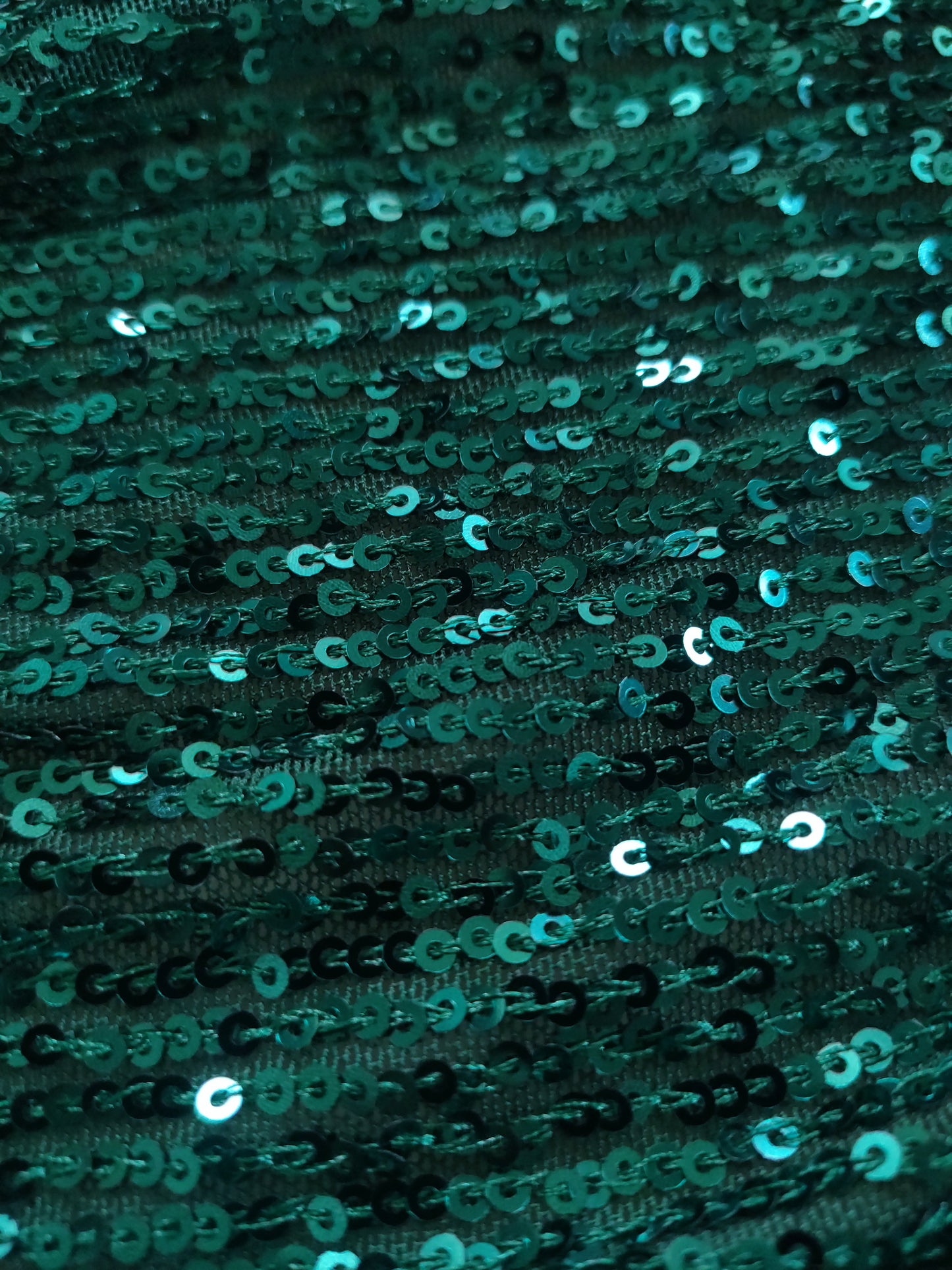 Bottle Green Sequin embroidered on Imported Lycra net