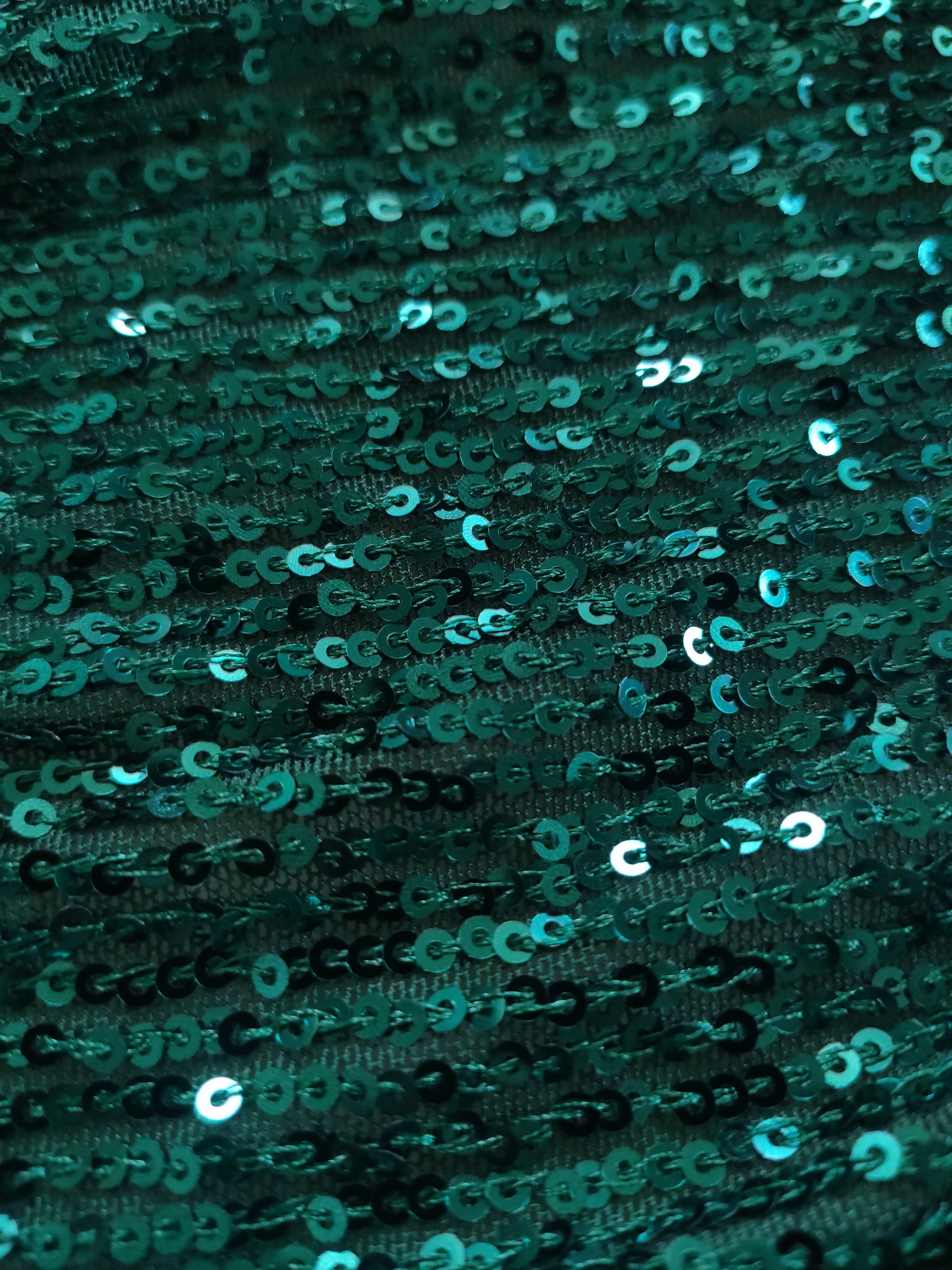 Bottle Green Sequin embroidered on Imported Lycra net